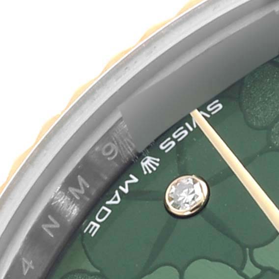 The image shows a close-up of the dial and bezel of a Rolex Mid-Size 278273 Women's Steel and Gold (two tone) Green Dial 278273 Women's Steel and Gold (two tone) Green Dial watch, highlighting a diamond marker and "Swiss Made."