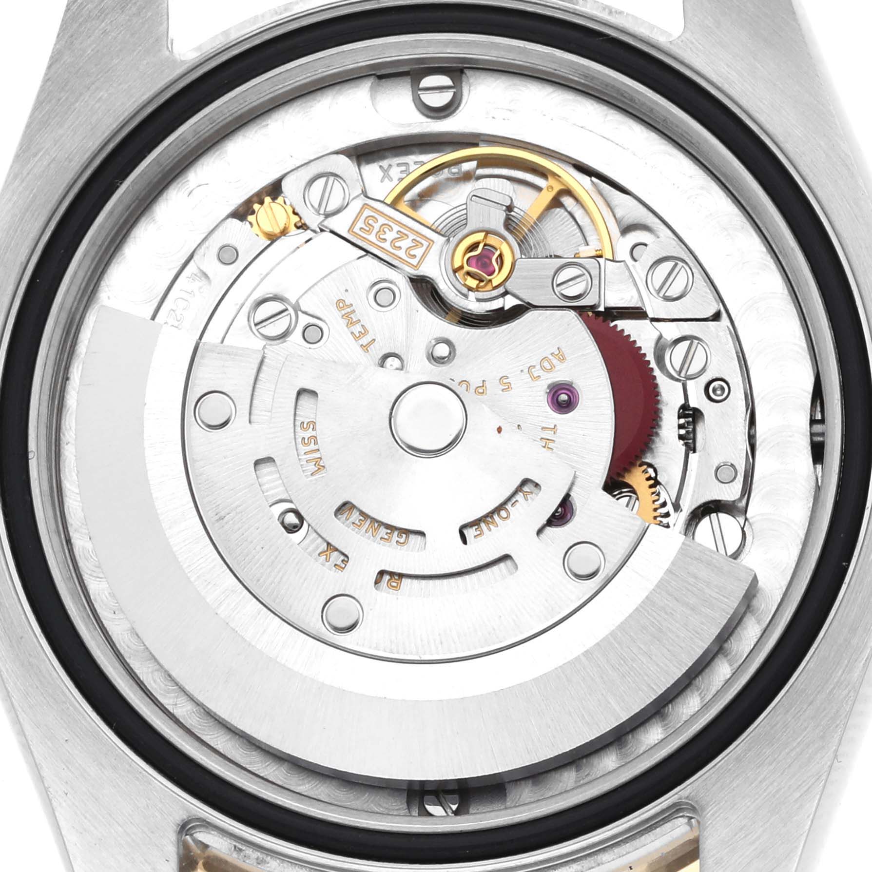 The image shows the movement and internal mechanics of a Rolex Mid-Size 178383 Women
s Steel and Gold (two tone) Silver Dial watch from a back view angle.