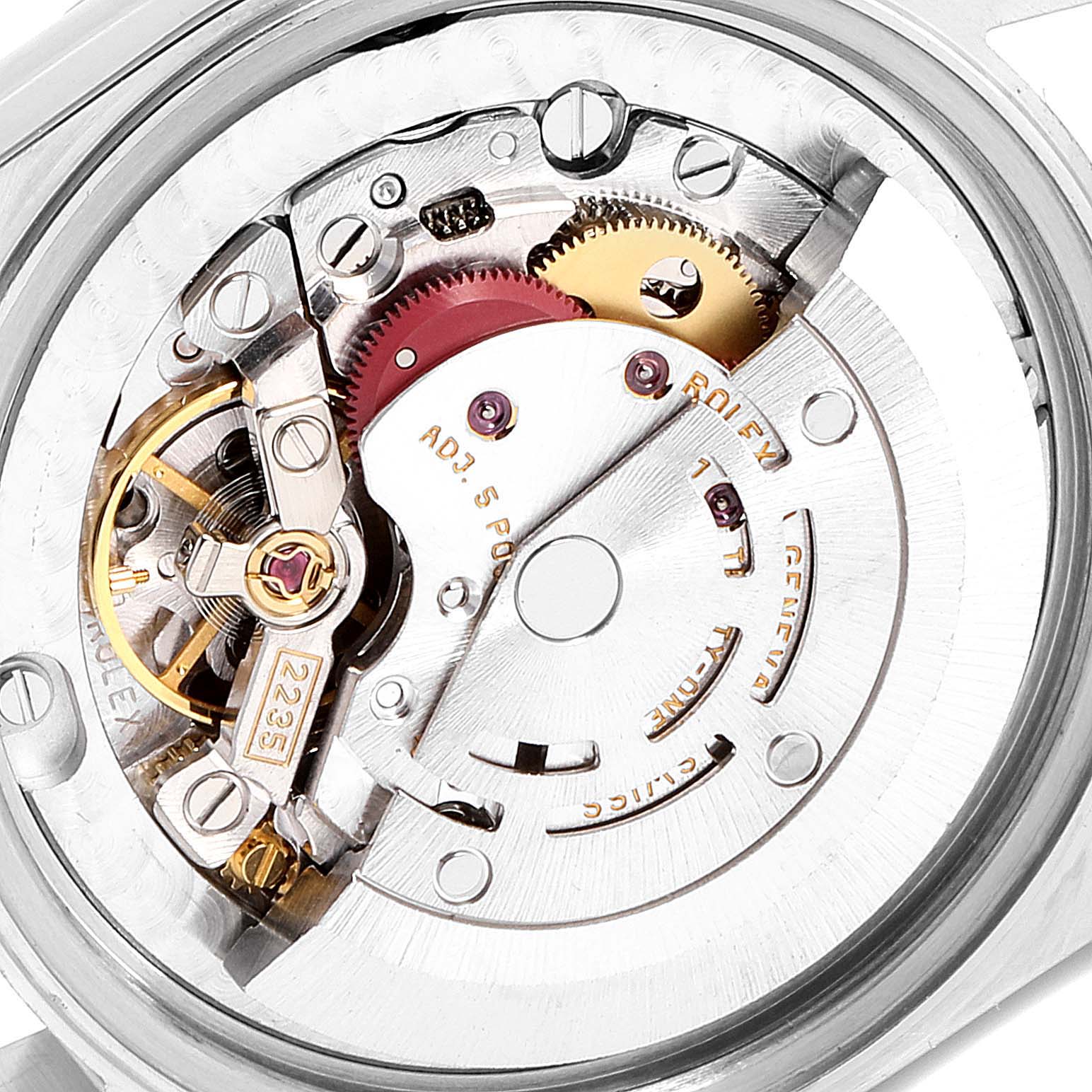 This image shows a close-up of the movement mechanism of a mid-size Rolex watch, highlighting the intricate internal components.