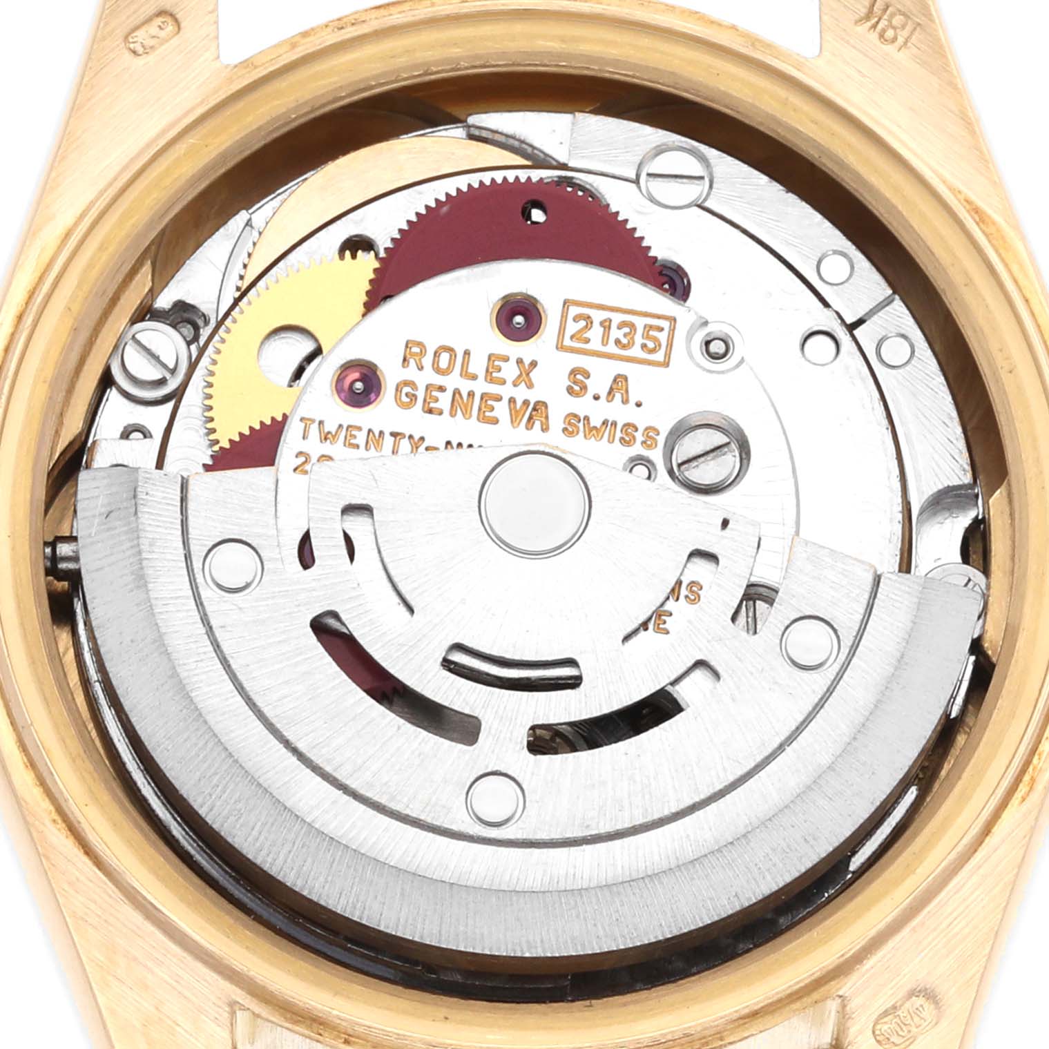The image shows the internal mechanism of the Rolex President 69178 Women's Yellow Gold White Dial 69178 Women's Yellow Gold White Dial watch viewed from the back, highlighting gears and the rotor.
