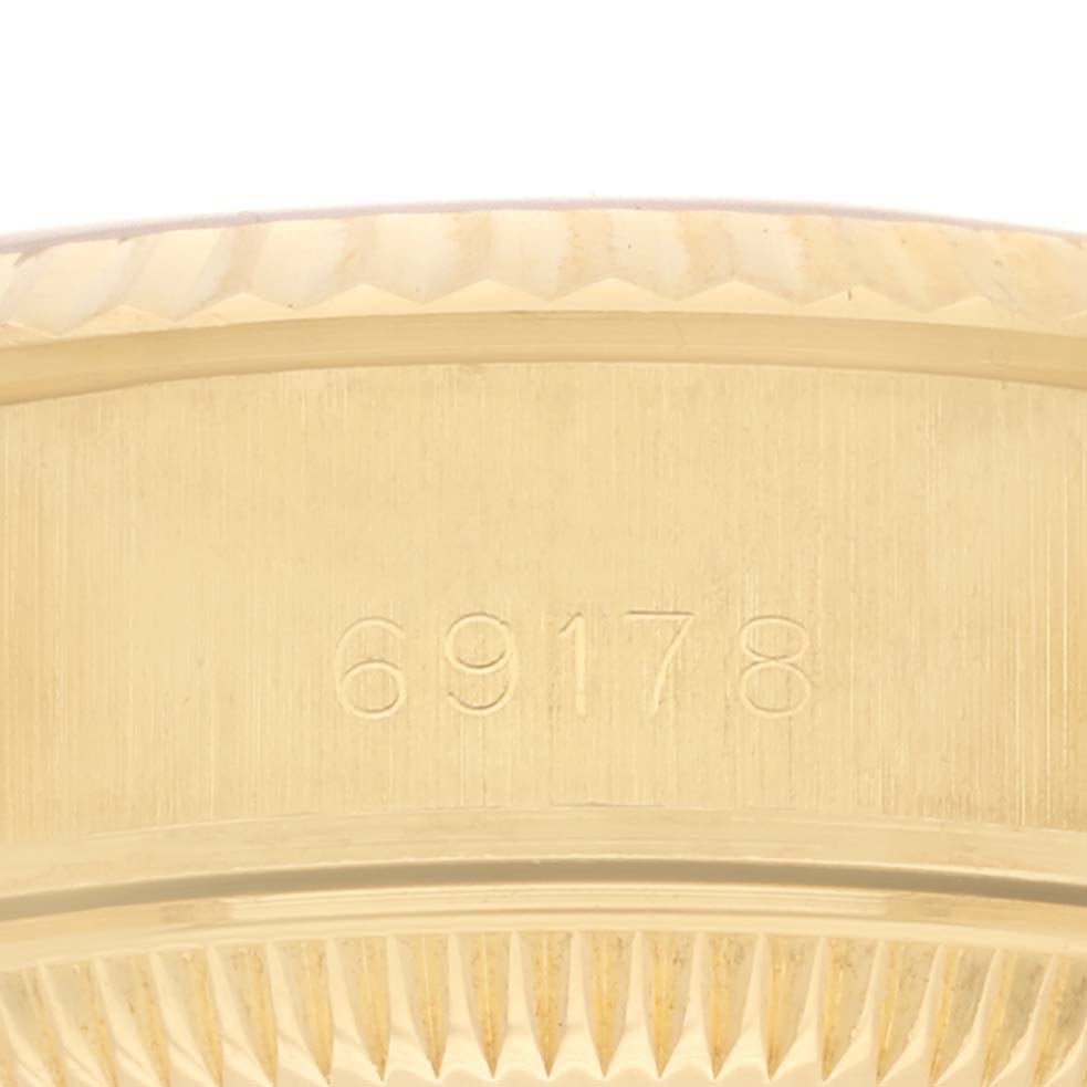 The image shows the side view of the Rolex President 69178 Women's Yellow Gold White Dial 69178 Women's Yellow Gold White Dial model's case with the model number 69178 engraved.