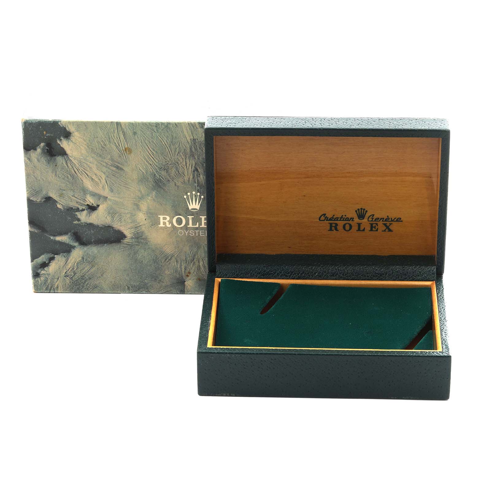 The image shows an open Rolex Vintage Collection 1603 Men's Stainless Steel Silver Dial 1603 Men's Stainless Steel Silver Dial watch box, revealing its interior with a green insert.