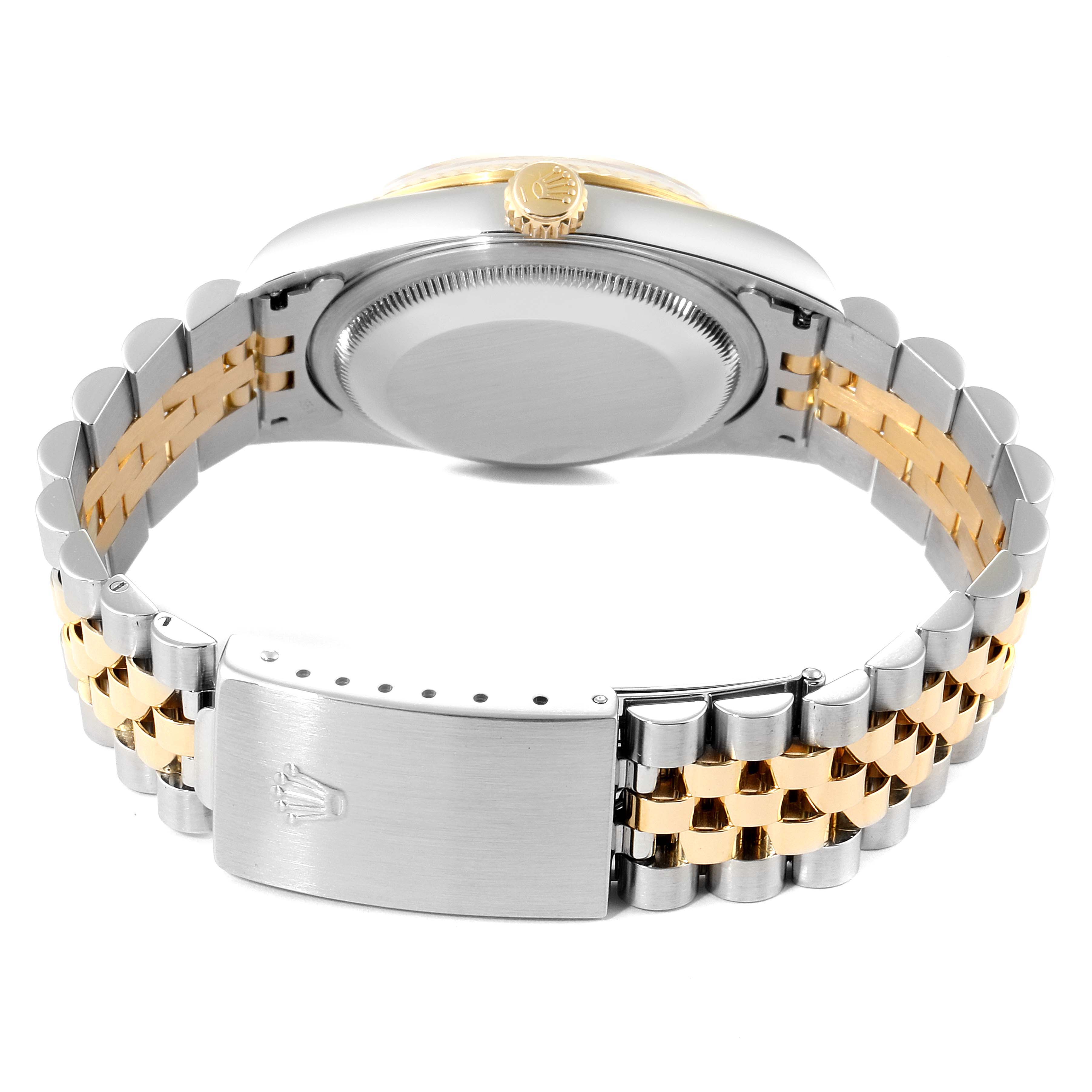 This Rolex Datejust 16233 Men's Steel and Gold (two tone) Champagne Dial 16233 Men's Steel and Gold (two tone) Champagne Dial watch is shown from the back, highlighting the caseback, crown, and two-tone bracelet with clasp.