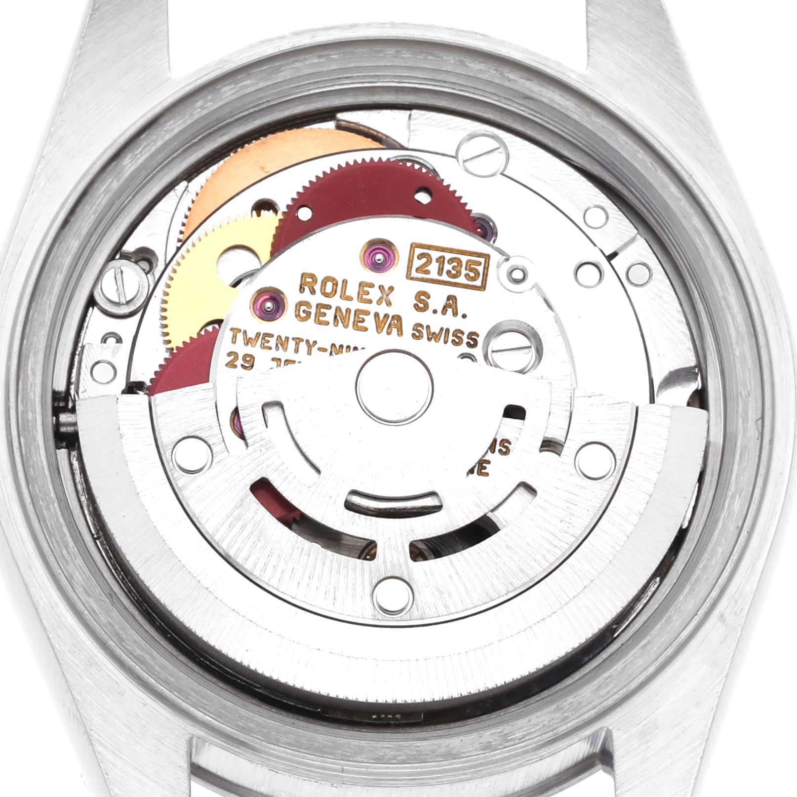 The image shows the movement mechanism of a Rolex Datejust 69174 Women's Stainless Steel Silver Dial 69174 Women's Stainless Steel Silver Dial from a back angle, highlighting its intricate gears and rotor.