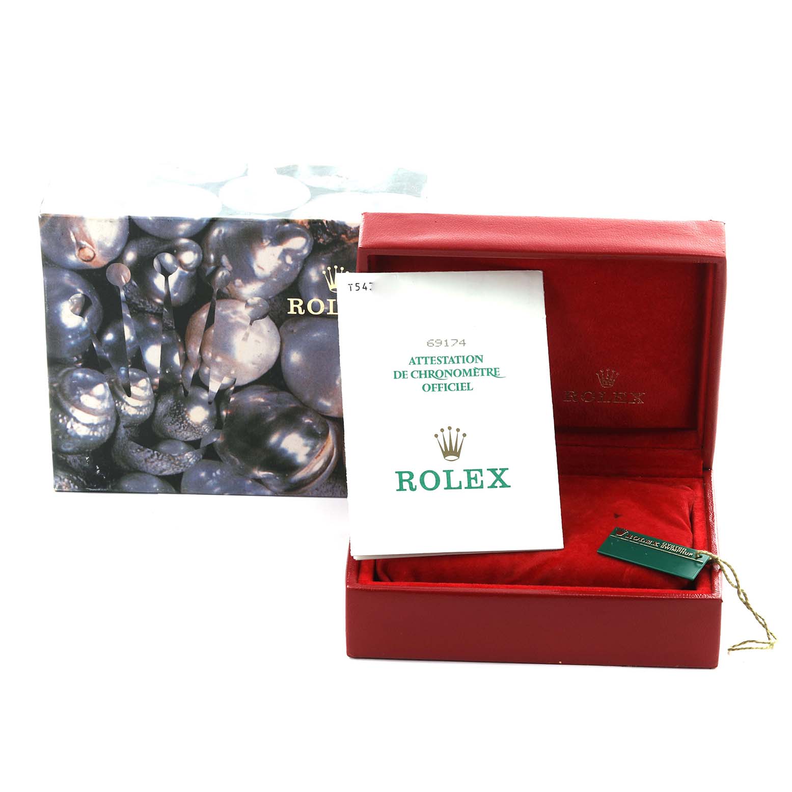 The image shows a Rolex Datejust 69174 Women's Stainless Steel Silver Dial 69174 Women's Stainless Steel Silver Dial watch box, a manual, and a tag, viewed from the front.