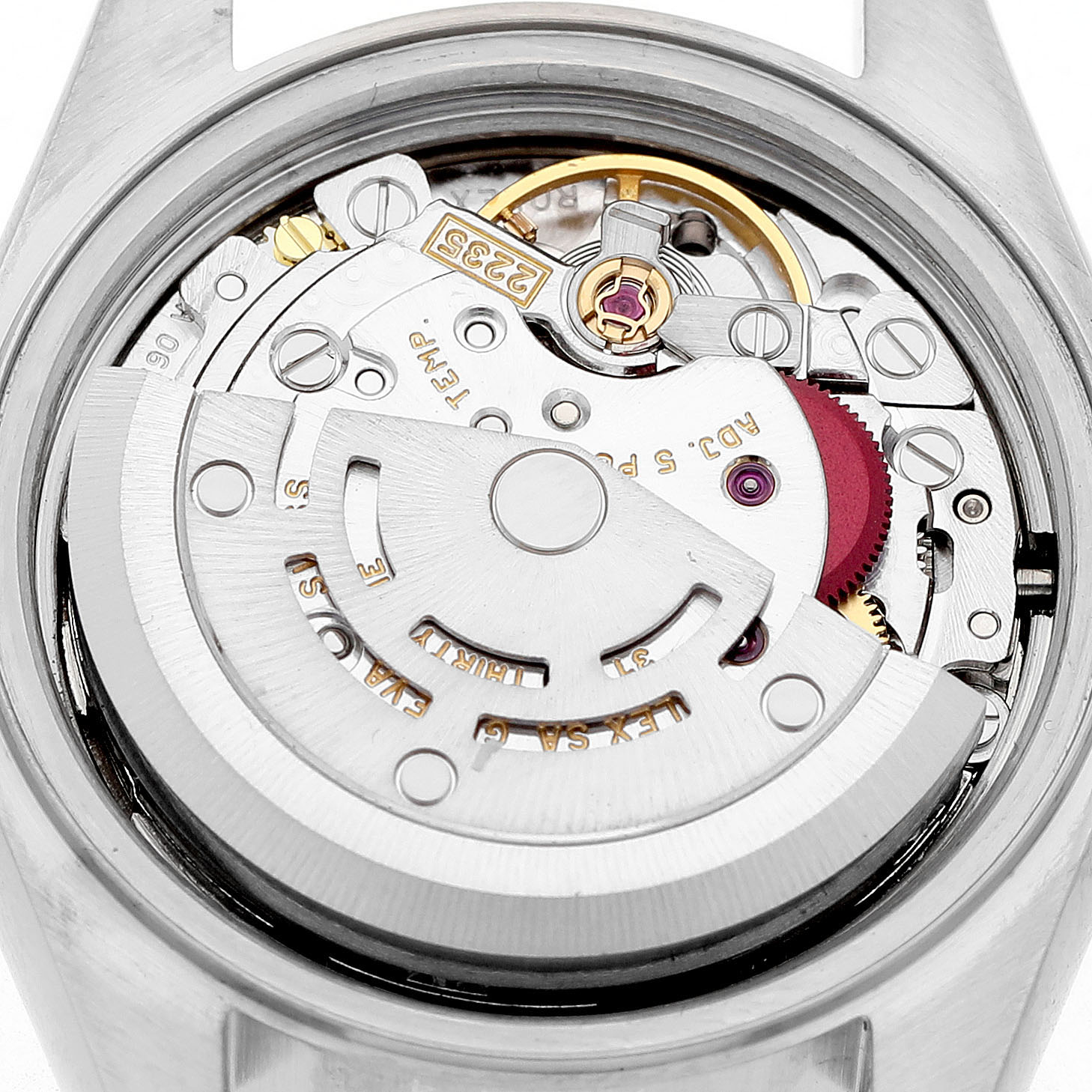 This image shows the movement of a Rolex Datejust 79174 Women's Stainless Steel Silver Dial watch from the back, highlighting its intricate components and rotor.