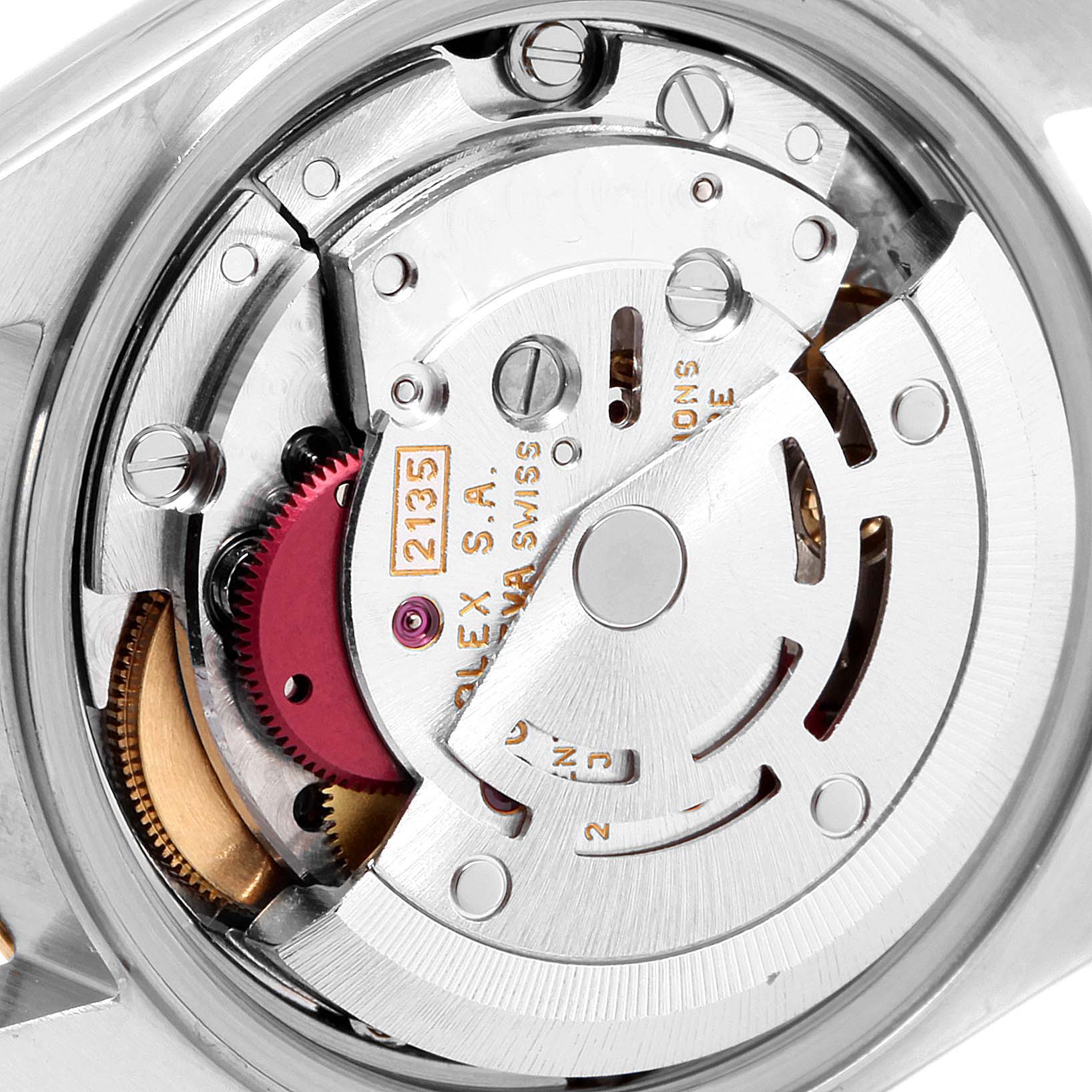 This close-up shows the intricate mechanical movement of a Rolex Datejust 69173 Women's Steel and Gold (two tone) Silver Dial 69173 Women's Steel and Gold (two tone) Silver Dial watch.