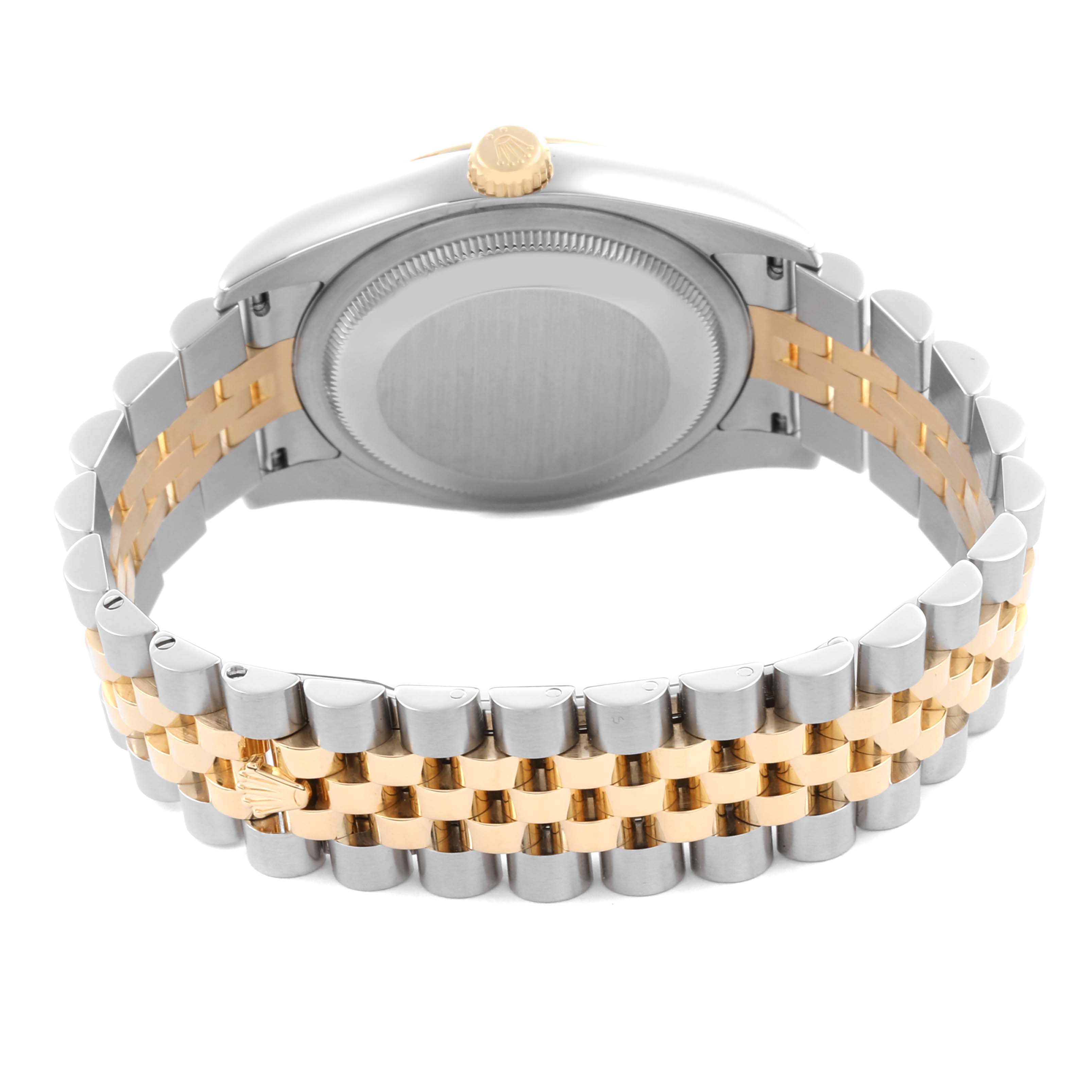 The image shows the back of the Rolex Datejust 116233 Men
s Steel and Gold (two tone) Champagne Dial 116233 Men
s Steel and Gold (two tone) Champagne Dial watch, highlighting the case back and two-tone bracelet.