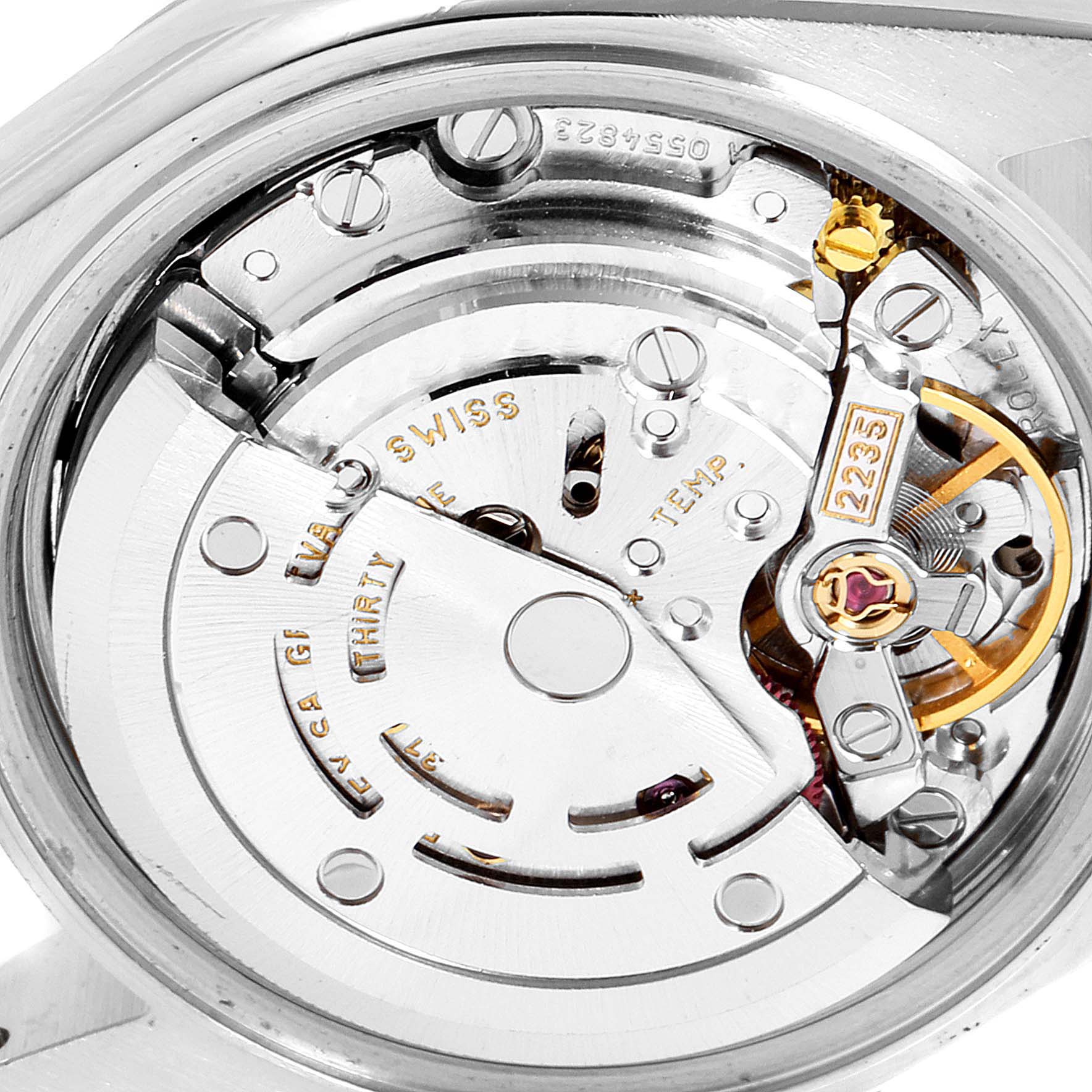 The image shows a close-up of the movement mechanism of the Rolex Datejust 79173 Women's Steel and Gold (two tone) Champagne Dial 79173 Women's Steel and Gold (two tone) Champagne Dial watch.