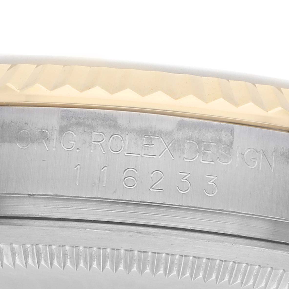 The image shows a close-up of the flange and case side of a Rolex Datejust 116233 Men
s Steel and Gold (two tone) Silver Dial, highlighting engraved details.
