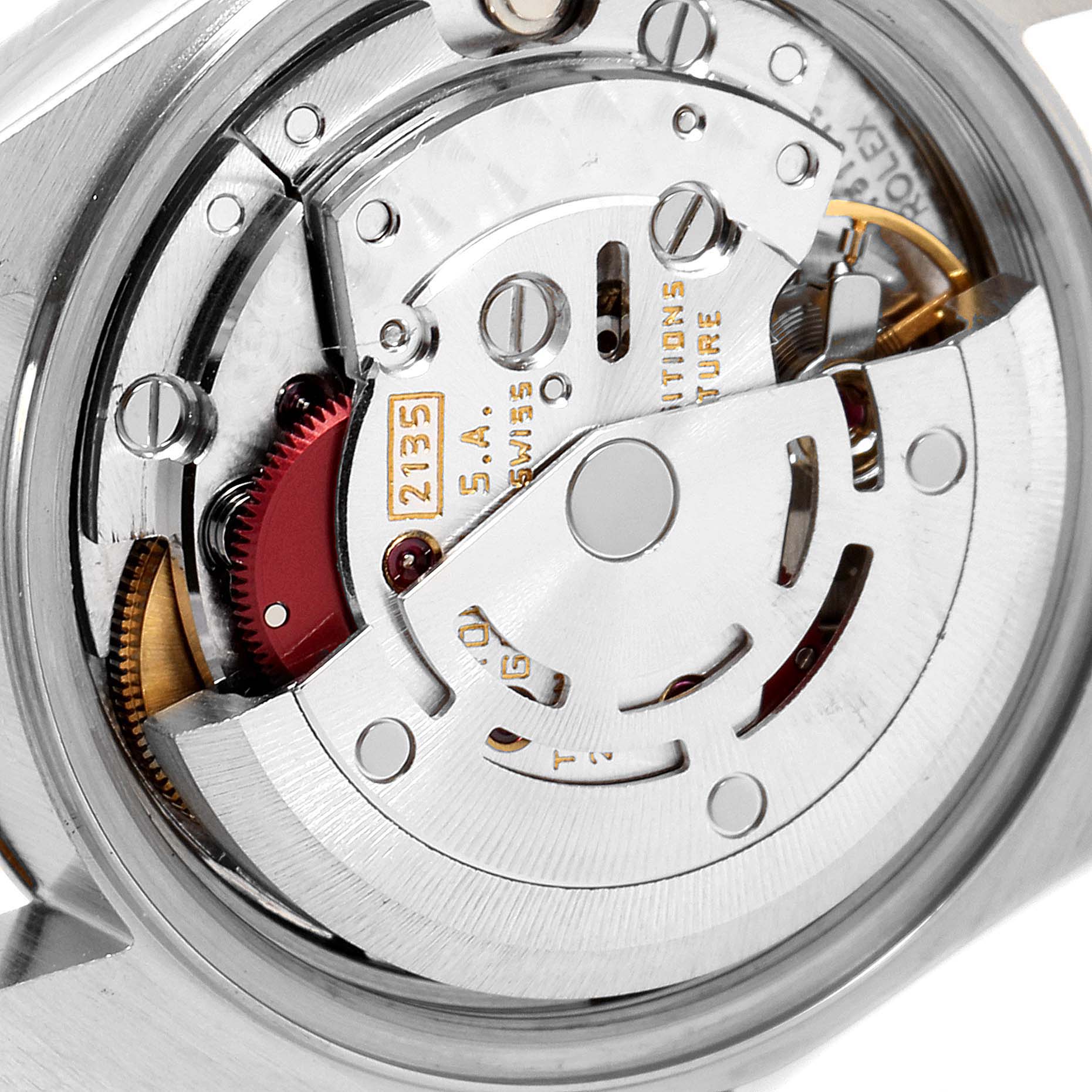 The image shows a close-up view of the internal mechanism of a Rolex Datejust 69173 Women's Steel and Gold (two tone) Silver Dial 69173 Women's Steel and Gold (two tone) Silver Dial watch, highlighting the movement components.