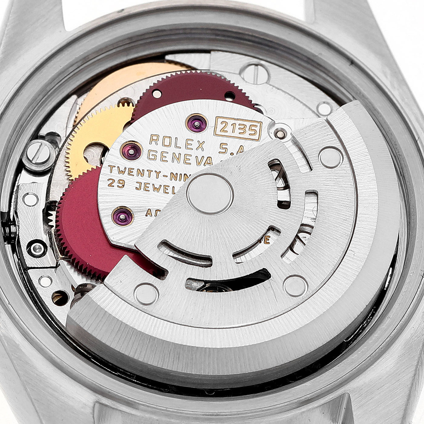 The image shows the back of a Rolex Datejust 69173 Women's Steel and Gold (two tone) Silver Dial watch, highlighting its movement with visible gears and rotor.