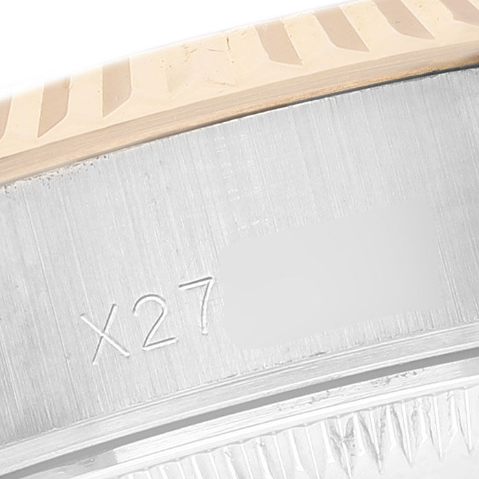 The image shows the inner side of the Rolex Datejust 69173 Women's Steel and Gold (two tone) Silver Dial watch case with engraved markings.