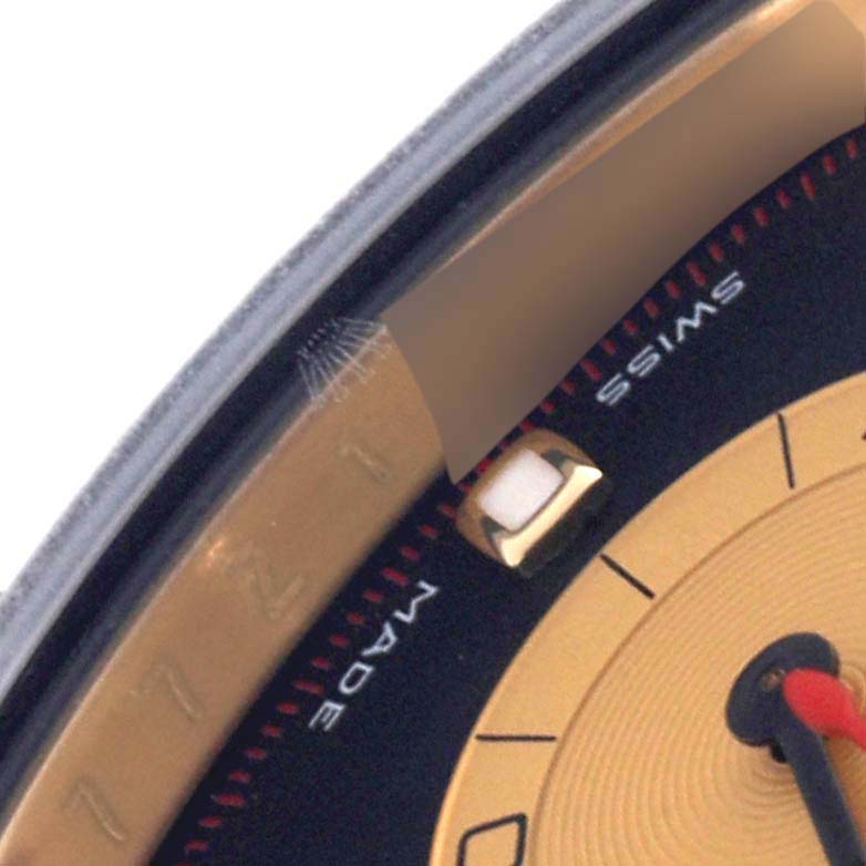 The image shows a close-up of the Rolex Daytona 116518LN Men's Yellow Gold Black Dial 116518LN Men's Yellow Gold Black Dial dial and bezel edge, highlighting the details of the watch face.