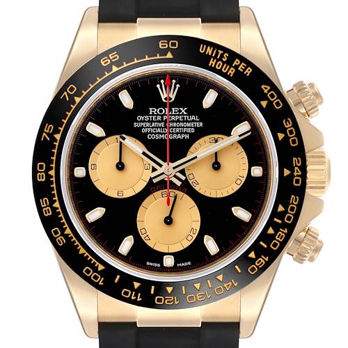 The image shows a frontal view of the Rolex Daytona watch, highlighting its black and gold dial and bezel.