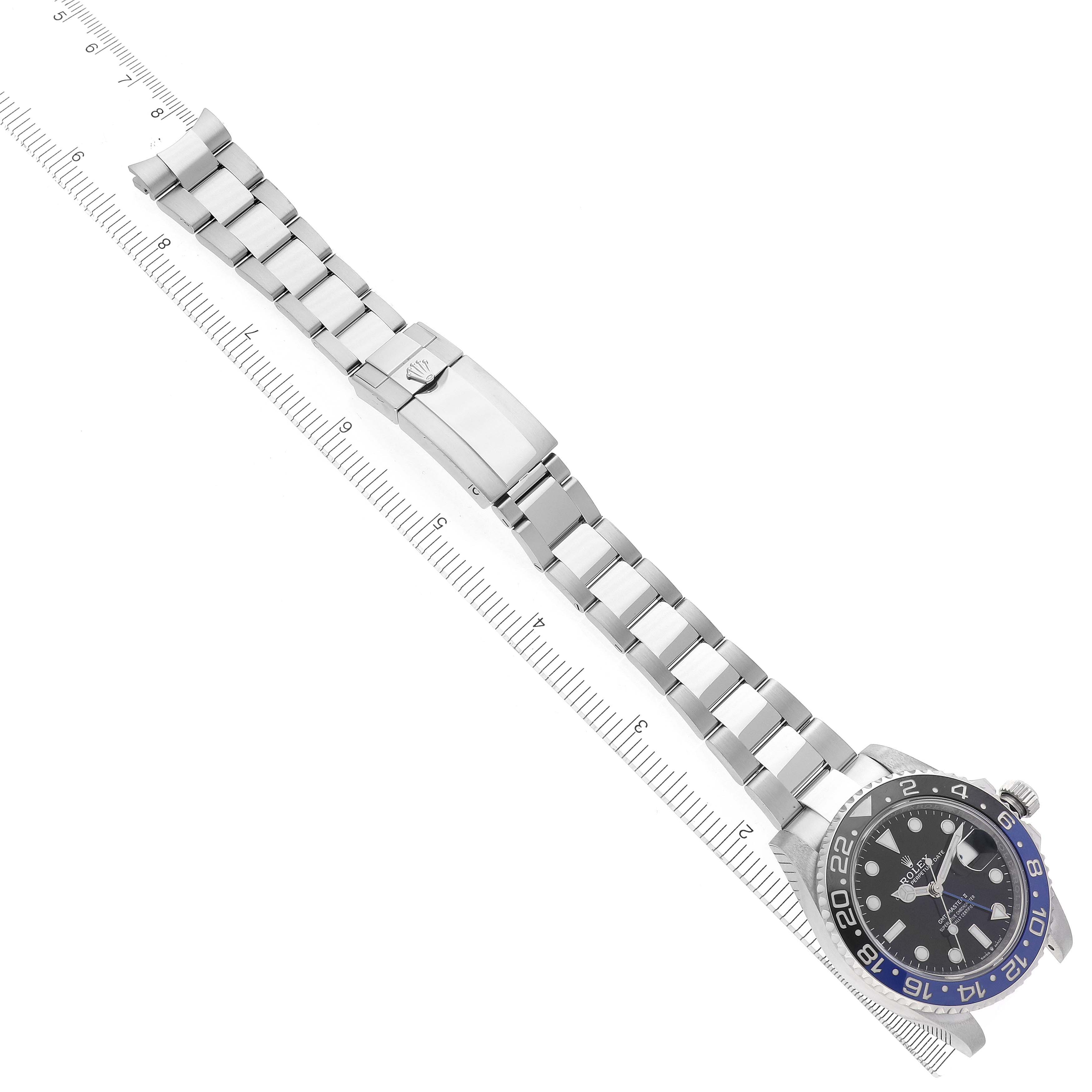 The Rolex GMT-Master 12671 Men's Stainless Steel Black Dial 12671 Men's Stainless Steel Black Dial watch is shown from a top-down angle, displaying the face, bezel, and fully extended bracelet.