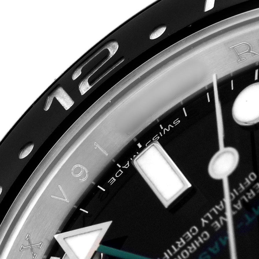 The image shows a close-up of the bezel and part of the dial of a Rolex GMT-Master 116710 Men's Stainless Steel Black Dial.
