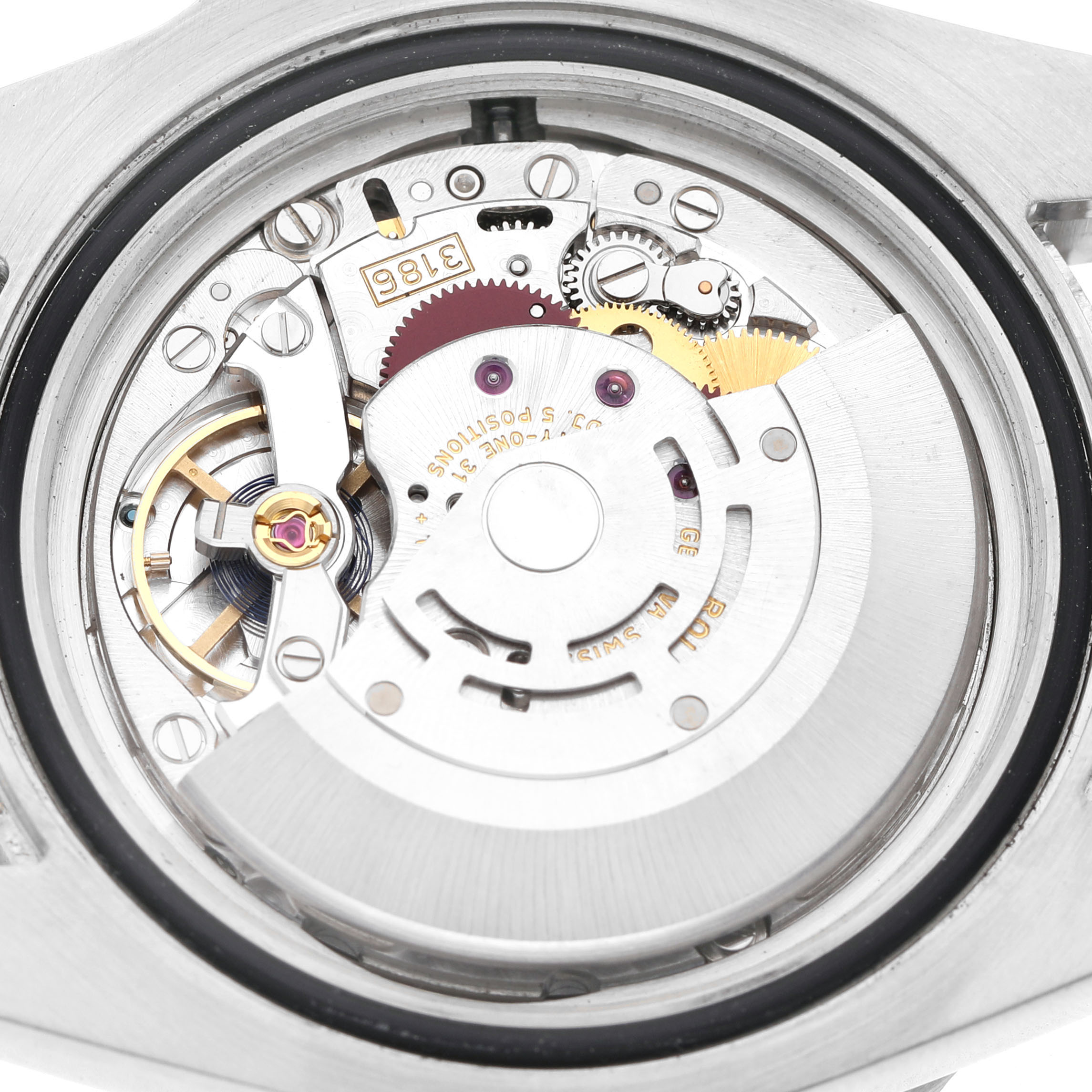 The image shows the movement mechanism of a Rolex GMT-Master 116710 Men's Stainless Steel Black Dial watch, focusing on its detailed internal components.