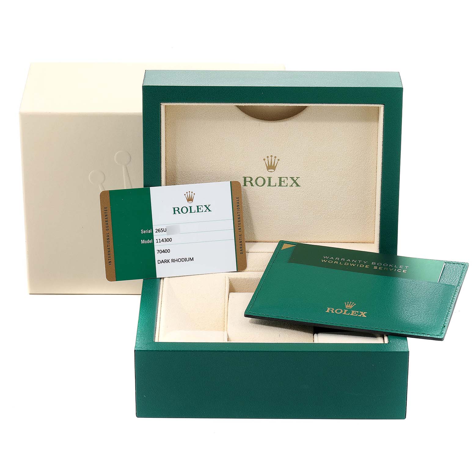 The image shows the packaging, warranty card, and booklet for a Rolex Oyster Perpetual 114300 Men's Stainless Steel Silver Dial 114300 Men's Stainless Steel Silver Dial watch model.