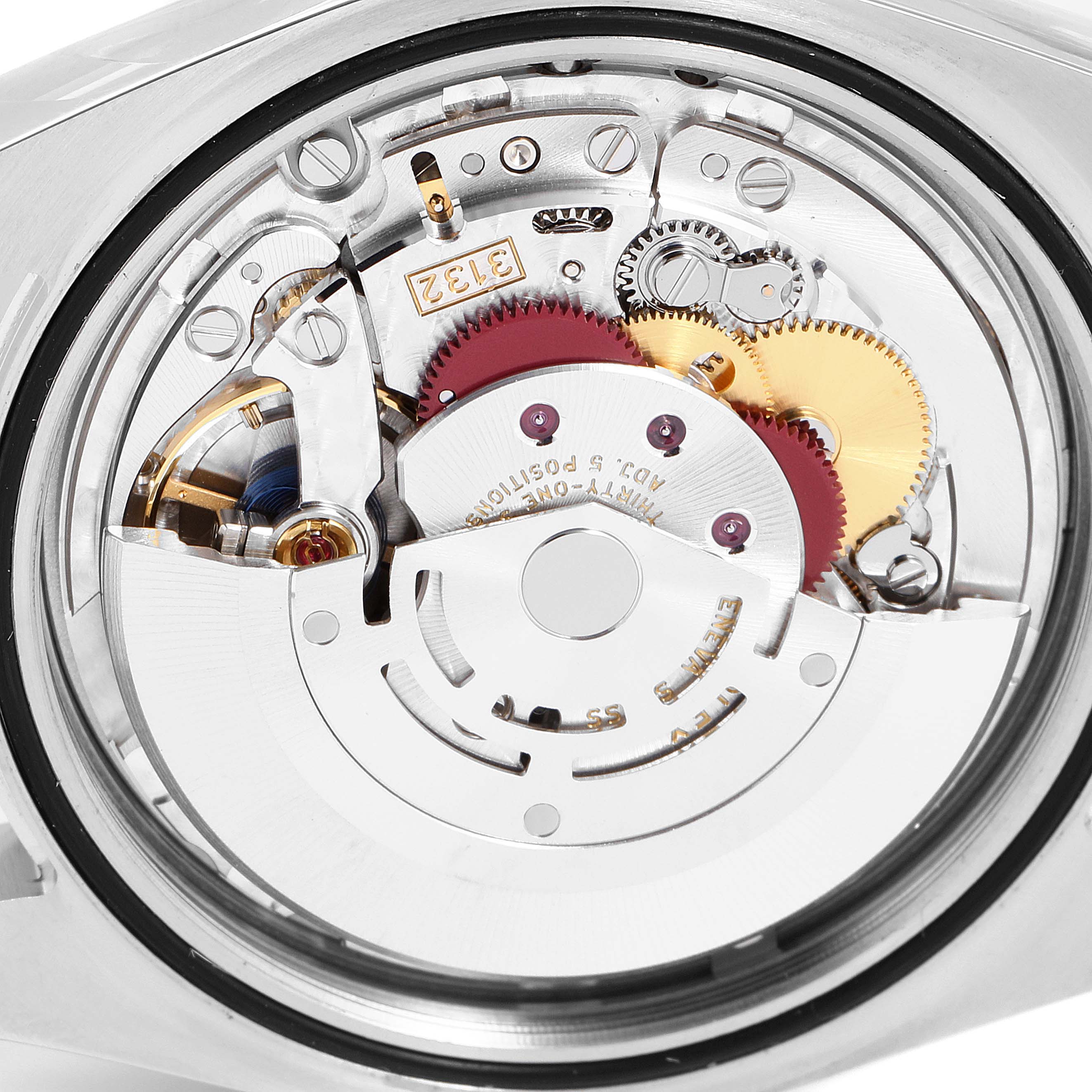 The image shows a close-up of the movement and internal mechanism of a Rolex Oyster Perpetual 114300 Men's Stainless Steel Silver Dial 114300 Men's Stainless Steel Silver Dial watch.