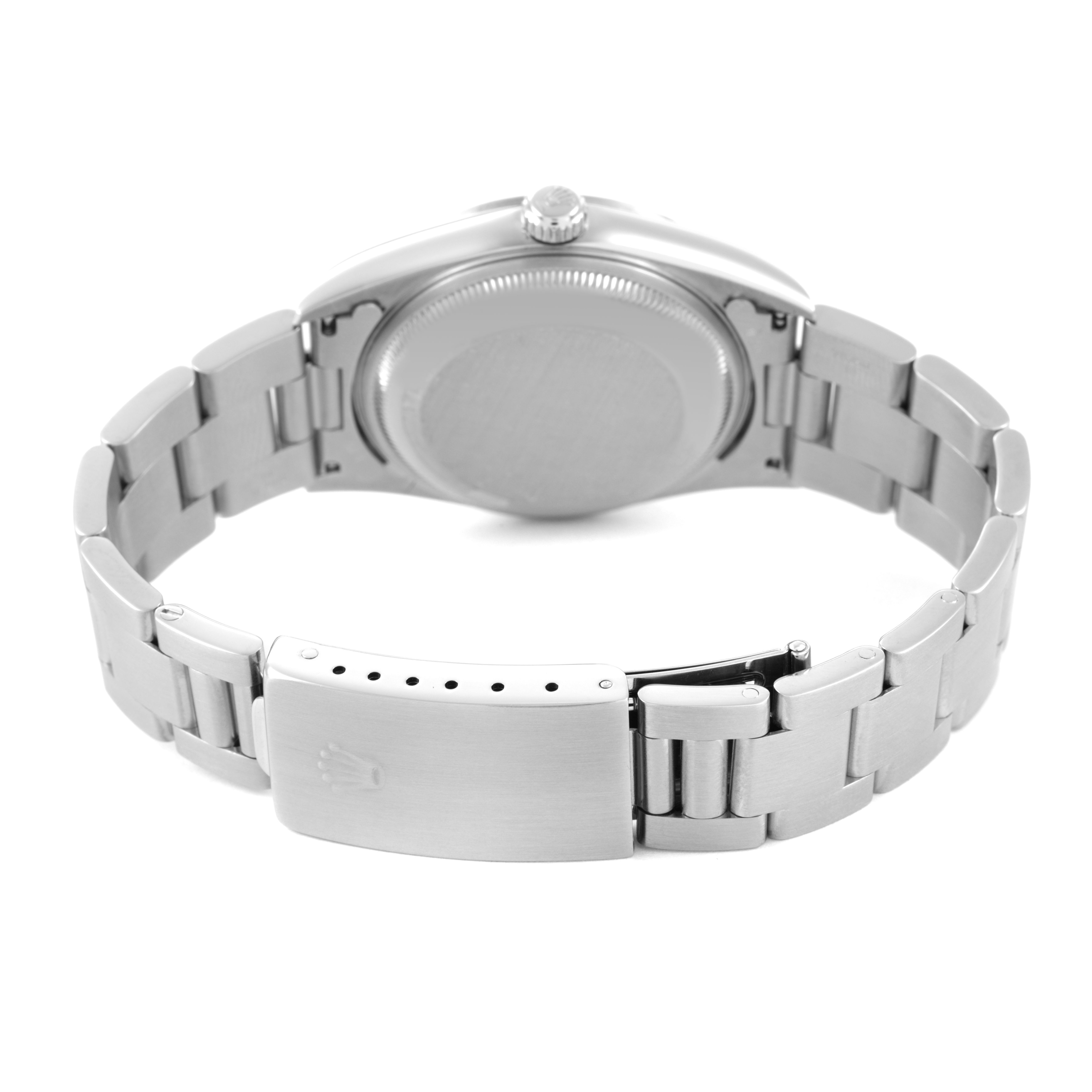 The Rolex Date 15200 Men's Stainless Steel Black Dial watch is shown from the back, displaying the bracelet and closed clasp.