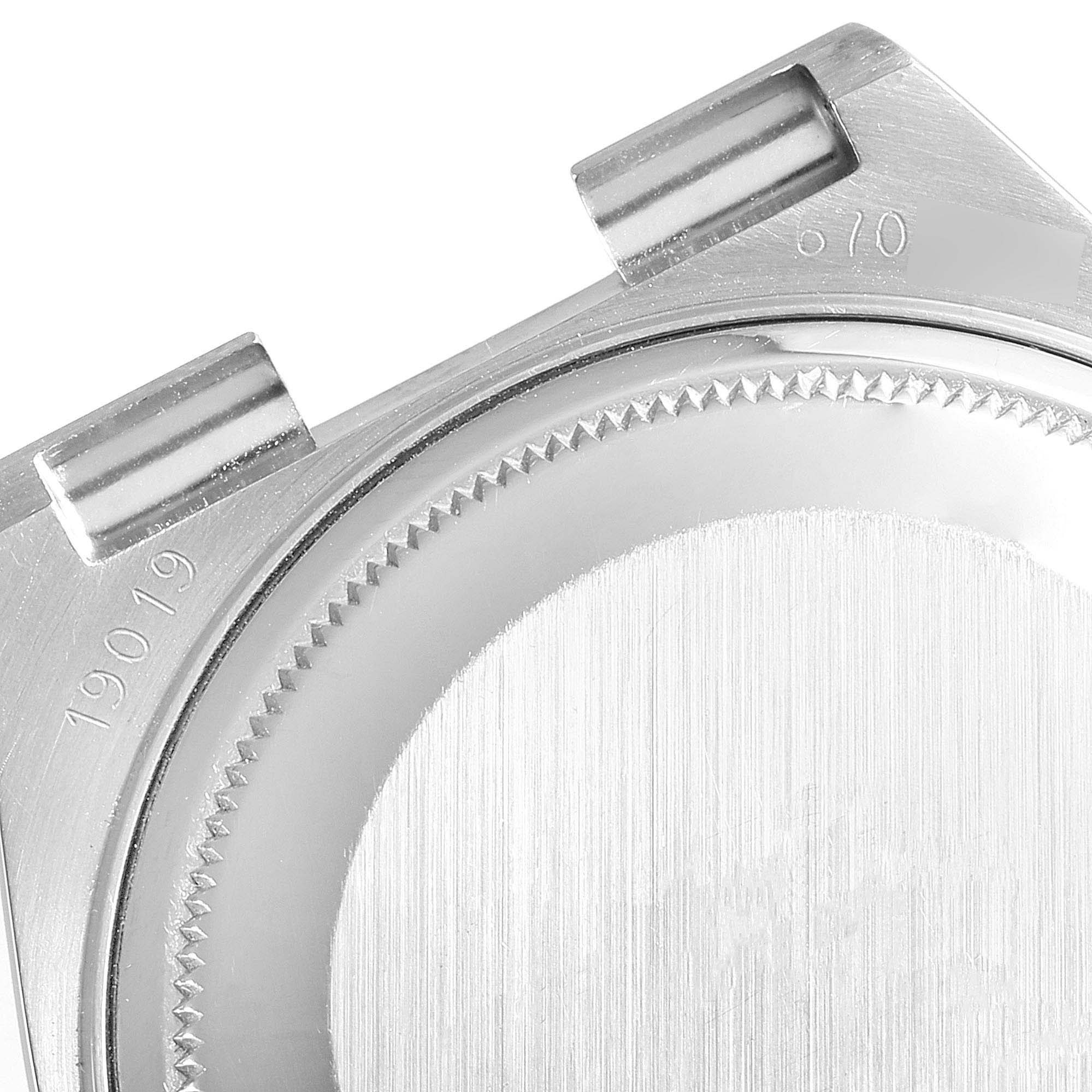 This image shows a close-up view of the back case of a Rolex Oysterquartz 19091 Men's White Gold Silver Dial 19091 Men's White Gold Silver Dial watch, including the lugs and case back.
