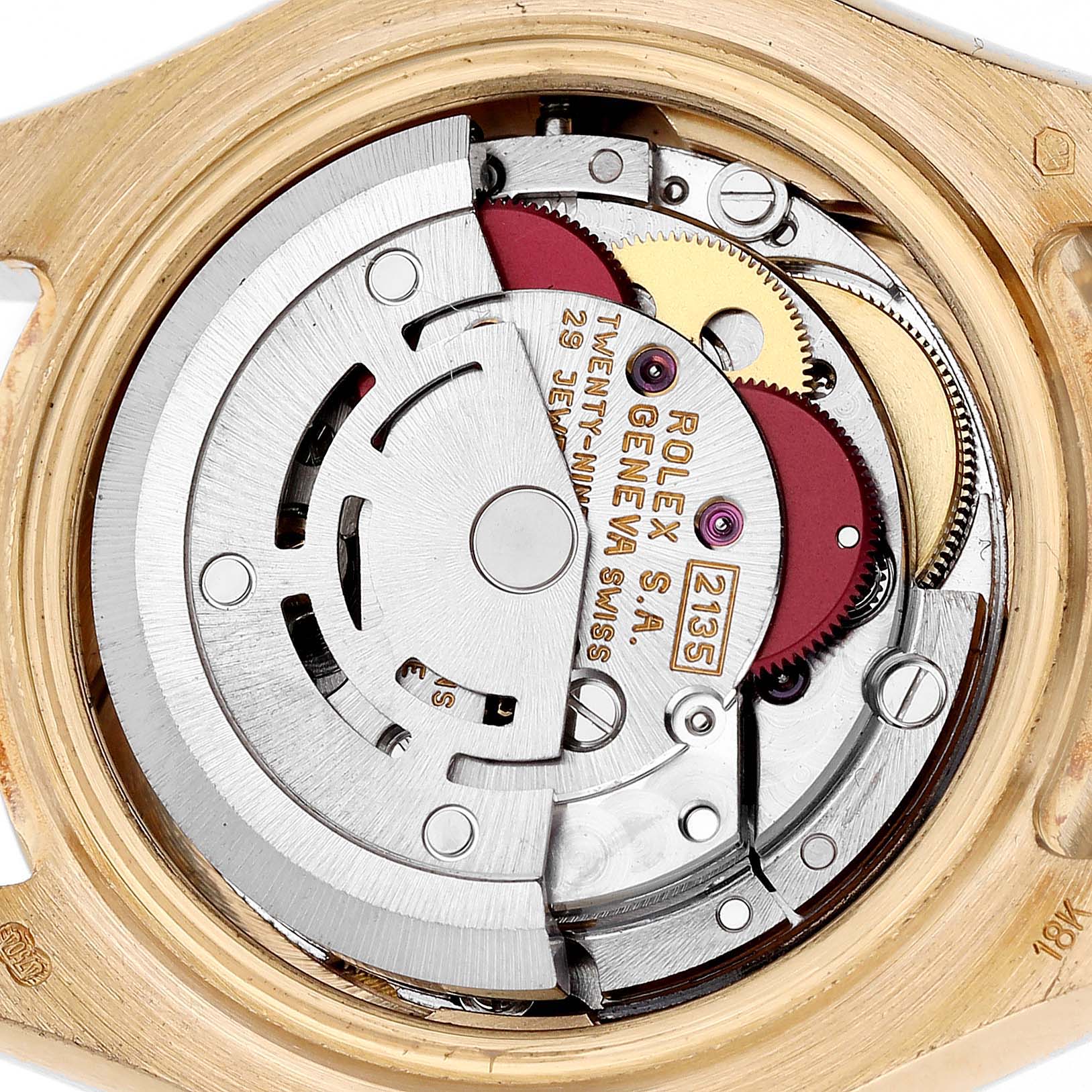 The image shows the internal mechanism of a Rolex Pearlmaster 69298 Women's Yellow Gold White Dial 69298 Women's Yellow Gold White Dial watch, highlighting gears and the rotor from the back angle.