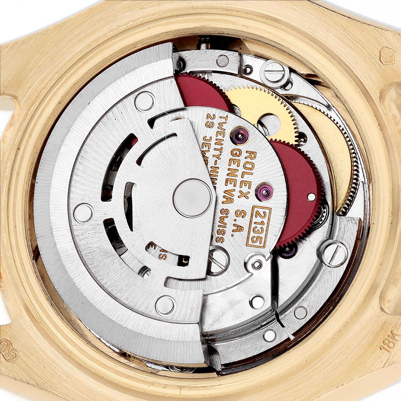 The image shows the movement of a Rolex Pearlmaster 69298 Women's Yellow Gold White Dial watch from a top-down angle, highlighting the internal mechanics and rotor.