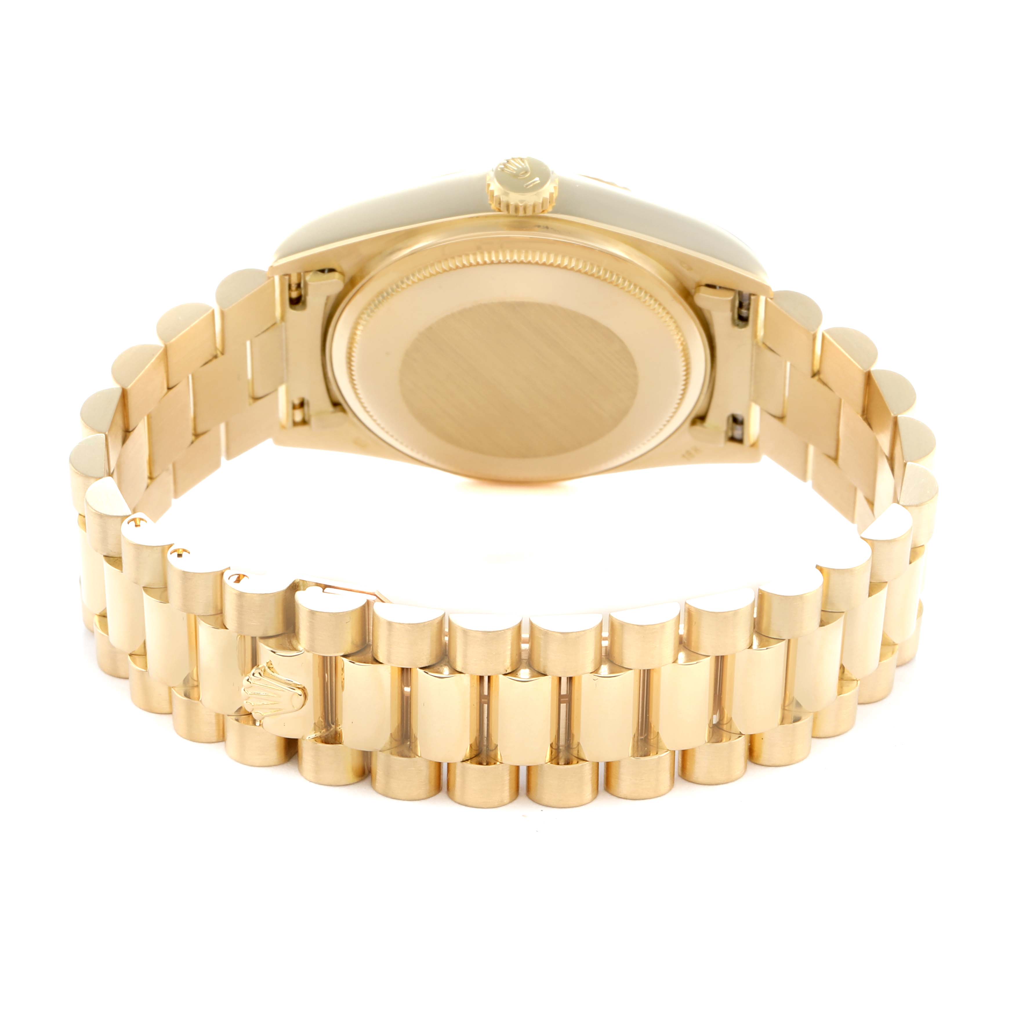 The Rolex President 18038 Men
s Yellow Gold Champagne Dial model is shown from the back, displaying the case back, crown, and the bracelet.