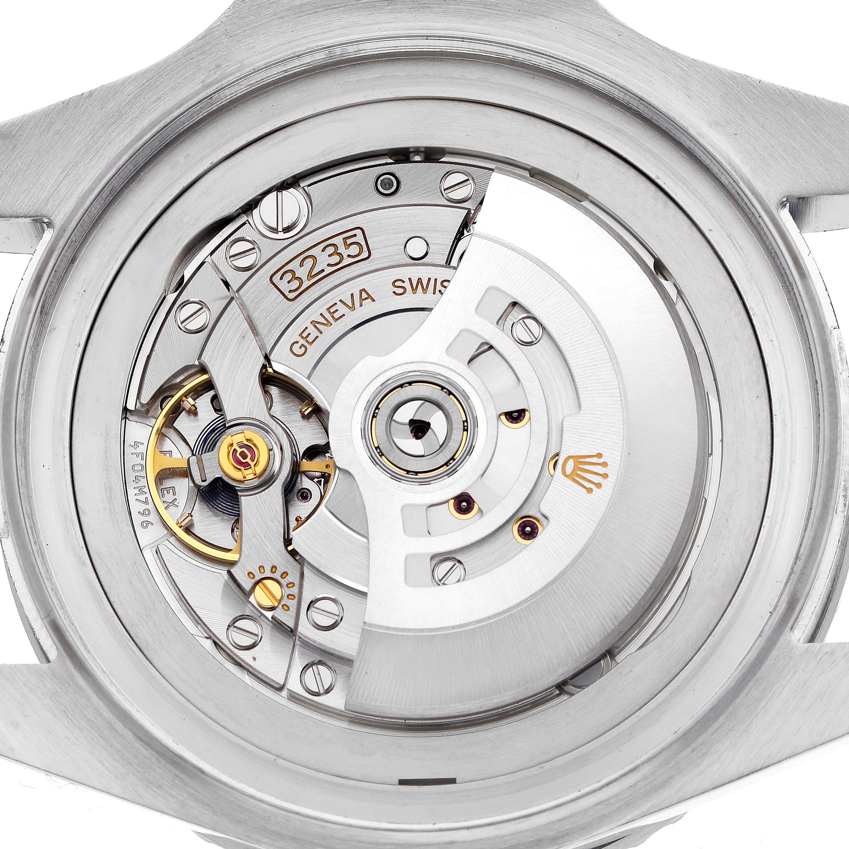 The image shows the movement of the Rolex Sea-Dweller 126660 Men
s Stainless Steel Blue Dial watch from a direct back angle, highlighting the rotor and mechanical components.