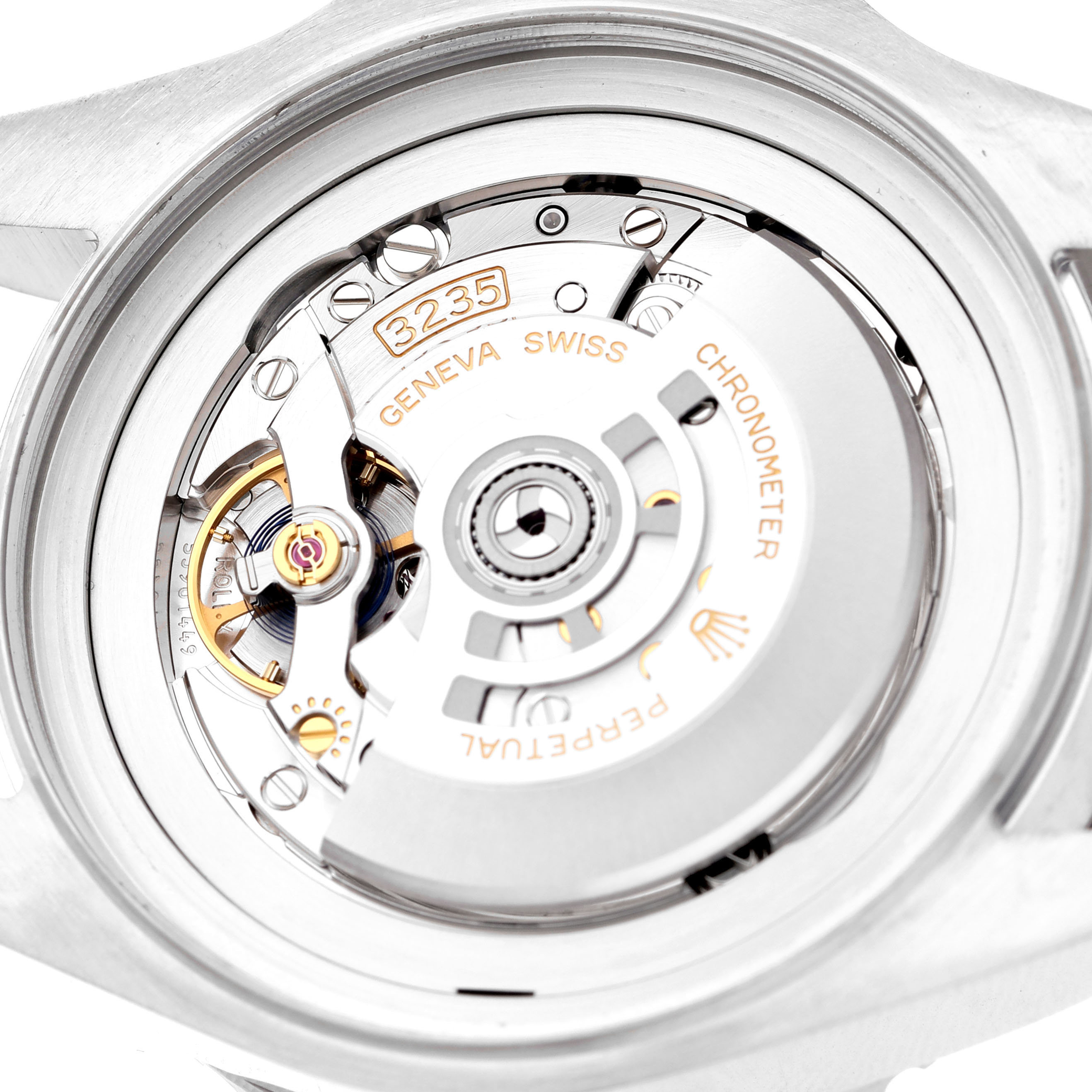The image shows the open case back of the Rolex Sea-Dweller 136660 Men's Stainless Steel Black Dial, highlighting its movement mechanism and intricate parts.