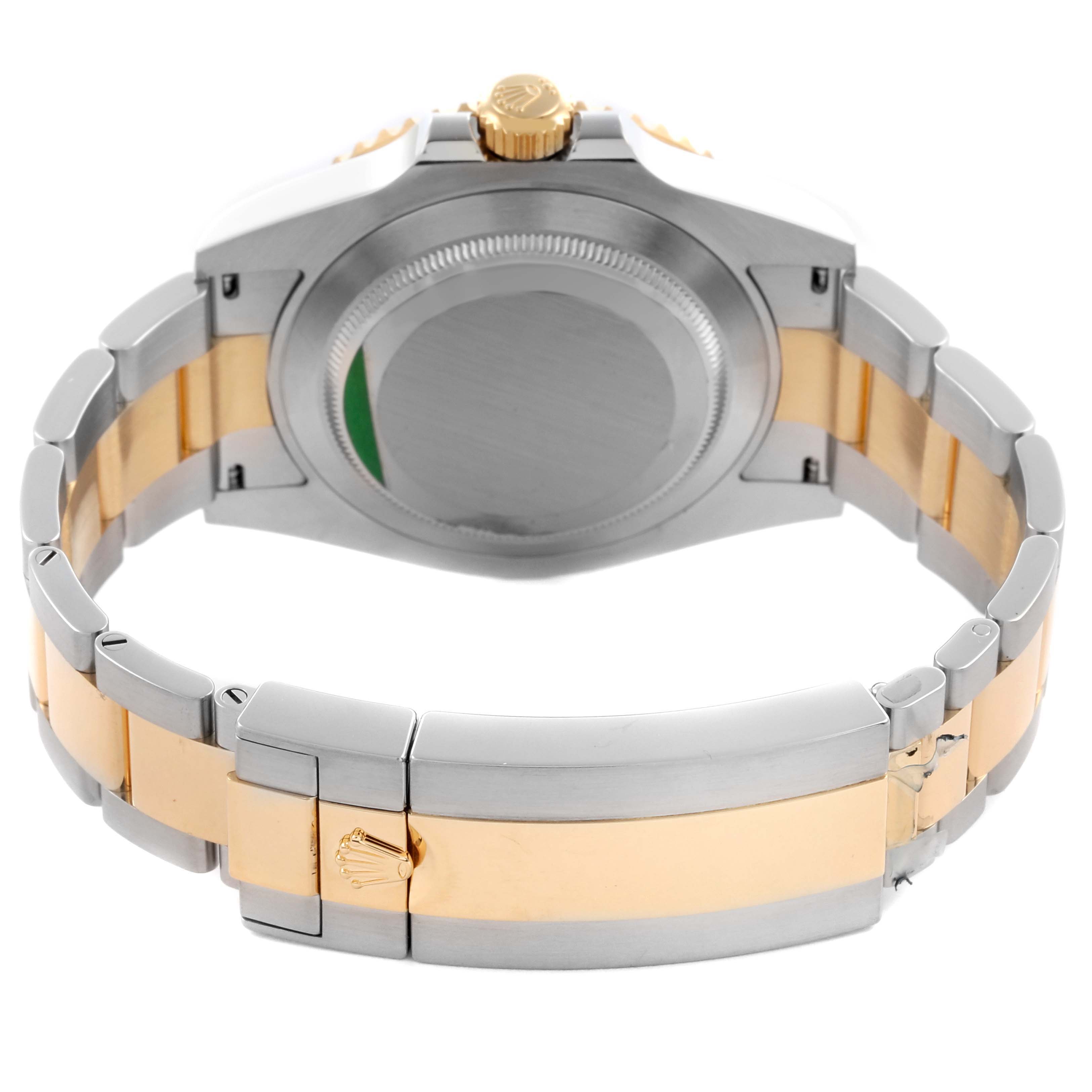 The image shows the back of a Rolex Submariner 126613 Men's Steel and Gold (two tone) Blue Dial 126613 Men's Steel and Gold (two tone) Blue Dial watch, highlighting the clasp and bracelet links.