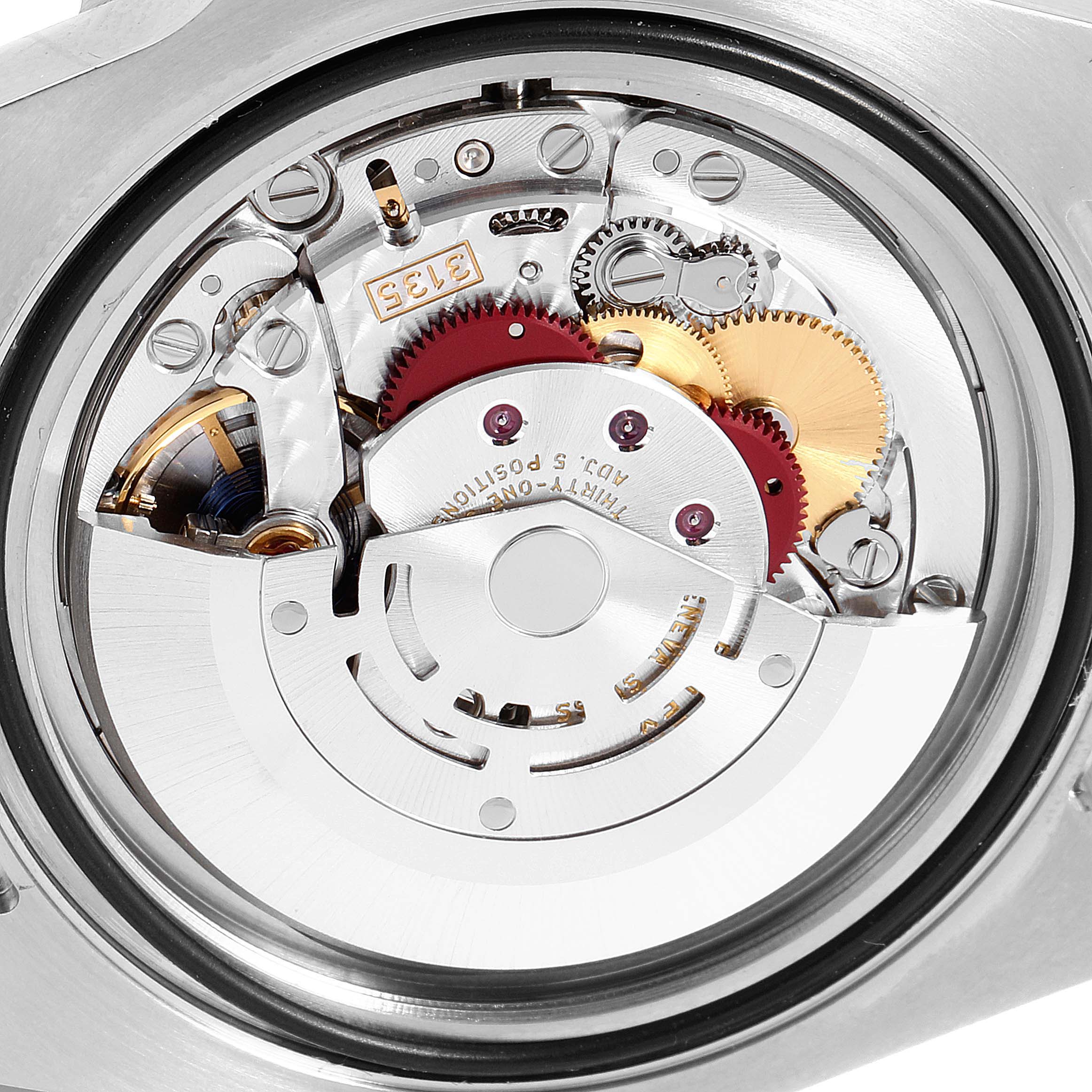 This image shows the internal movement mechanism of a Rolex Submariner 116610LV Men's Stainless Steel Green Dial 116610LV Men's Stainless Steel Green Dial watch from an overhead angle.