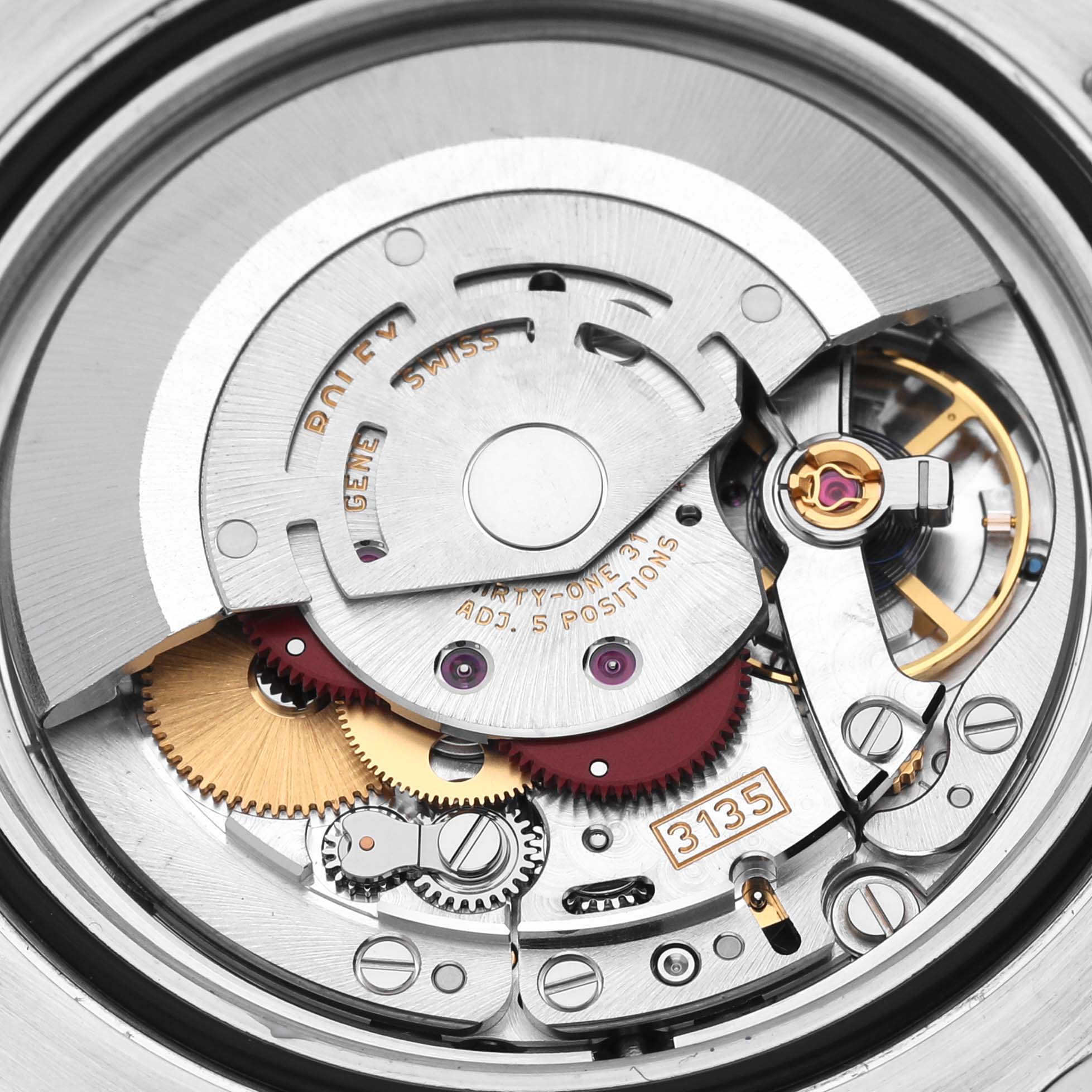 The image shows the intricate internal movement of a Rolex Submariner 116610LV Men's Stainless Steel Green Dial 116610LV Men's Stainless Steel Green Dial watch, focusing on its gears and mechanical components.