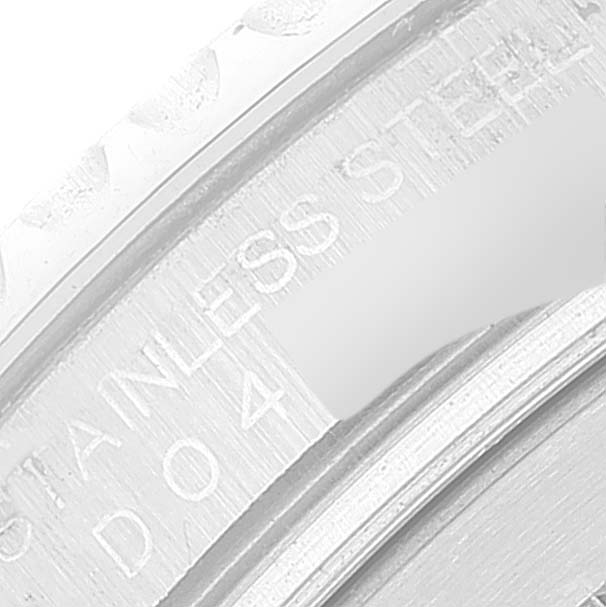 The image shows a close-up of the bezel and case back edge of a Rolex Yacht-Master 16622 Men's Stainless Steel Silver Dial 16622 Men's Stainless Steel Silver Dial watch, highlighting the "Stainless Steel" engraving.