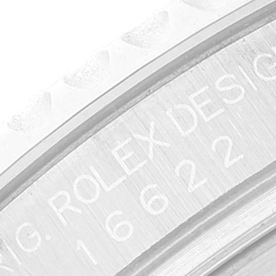 This close-up image shows the bezel and engravings on the inner ring of the Rolex Yacht-Master 16622 Men's Stainless Steel Silver Dial 16622 Men's Stainless Steel Silver Dial watch.