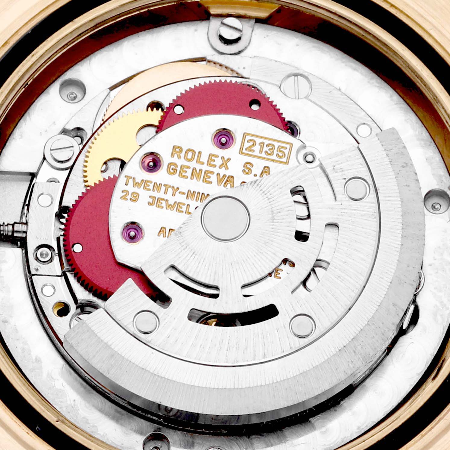 The image shows the internal mechanism of a Rolex Yacht-Master 68628 Men's Yellow Gold White Dial 68628 Men's Yellow Gold White Dial, highlighting gears and the rotor.