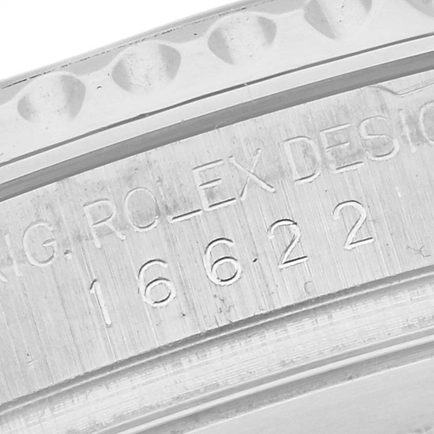 The image shows a close-up of the Rolex Yacht-Master Men's Stainless Steel Silver Dial Men's Stainless Steel Silver Dial's case side with its model number engraved.