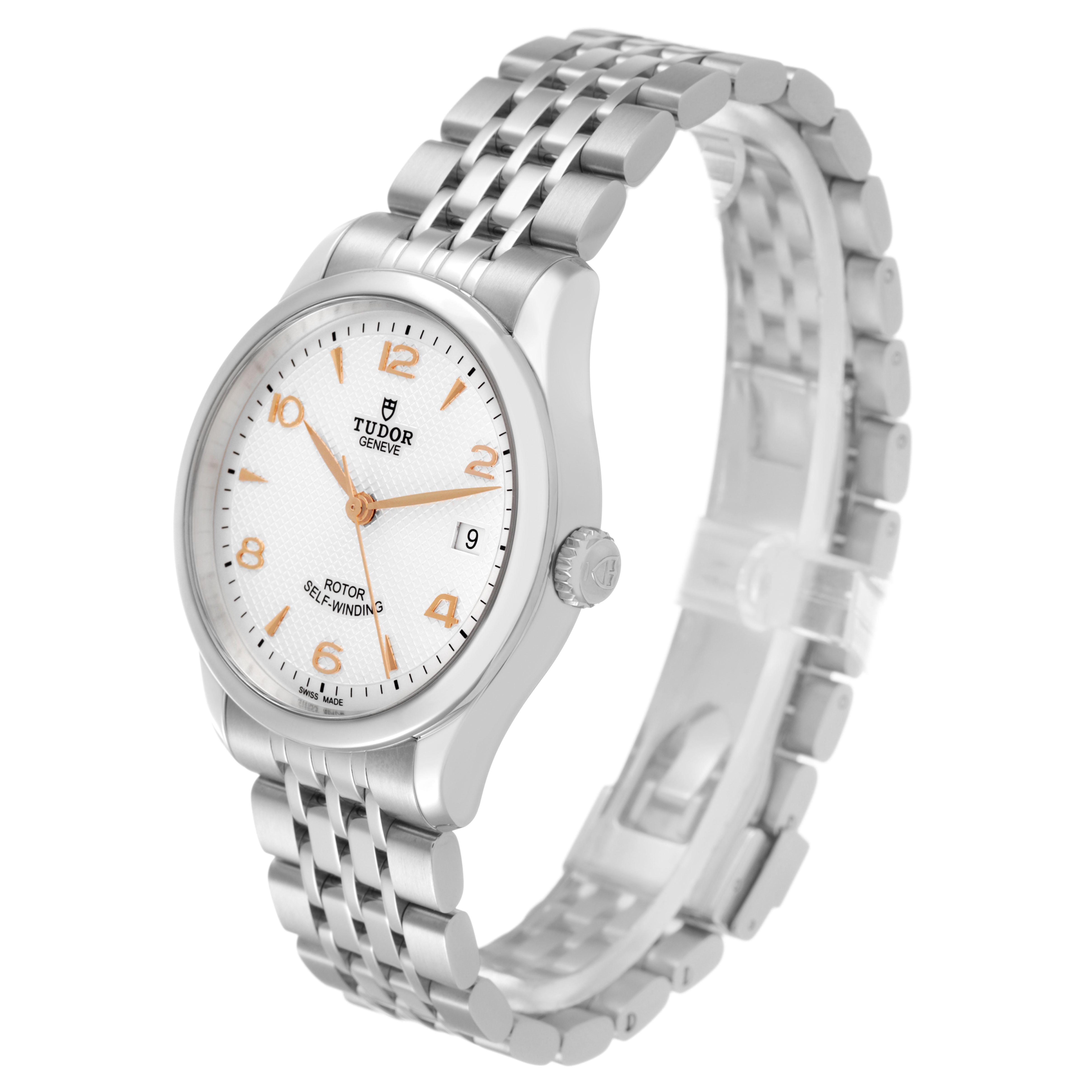 The Tudor 1926 M91450-0001 Men's Stainless Steel Silver Dial watch is shown at a three-quarter angle, highlighting the white dial, bracelet, and crown.