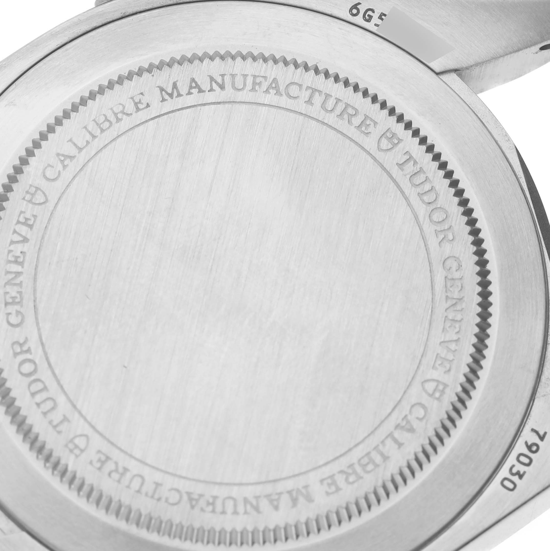 The image shows the back case of the Tudor Heritage Black Bay 79030 Men's Stainless Steel Black Dial 79030 Men's Stainless Steel Black Dial watch, focusing on the engraved details.