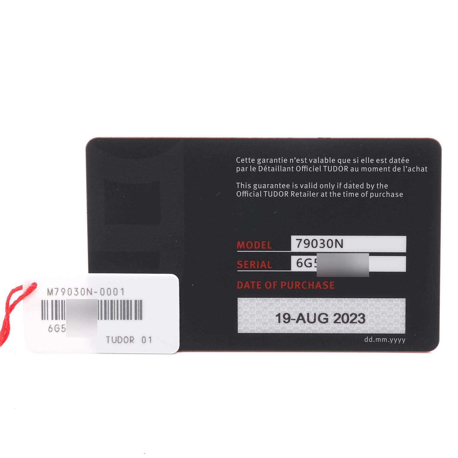 The image shows the warranty card for the Tudor Heritage Black Bay 79030 Men's Stainless Steel Black Dial 79030 Men's Stainless Steel Black Dial model 79030N, displaying model and serial numbers.