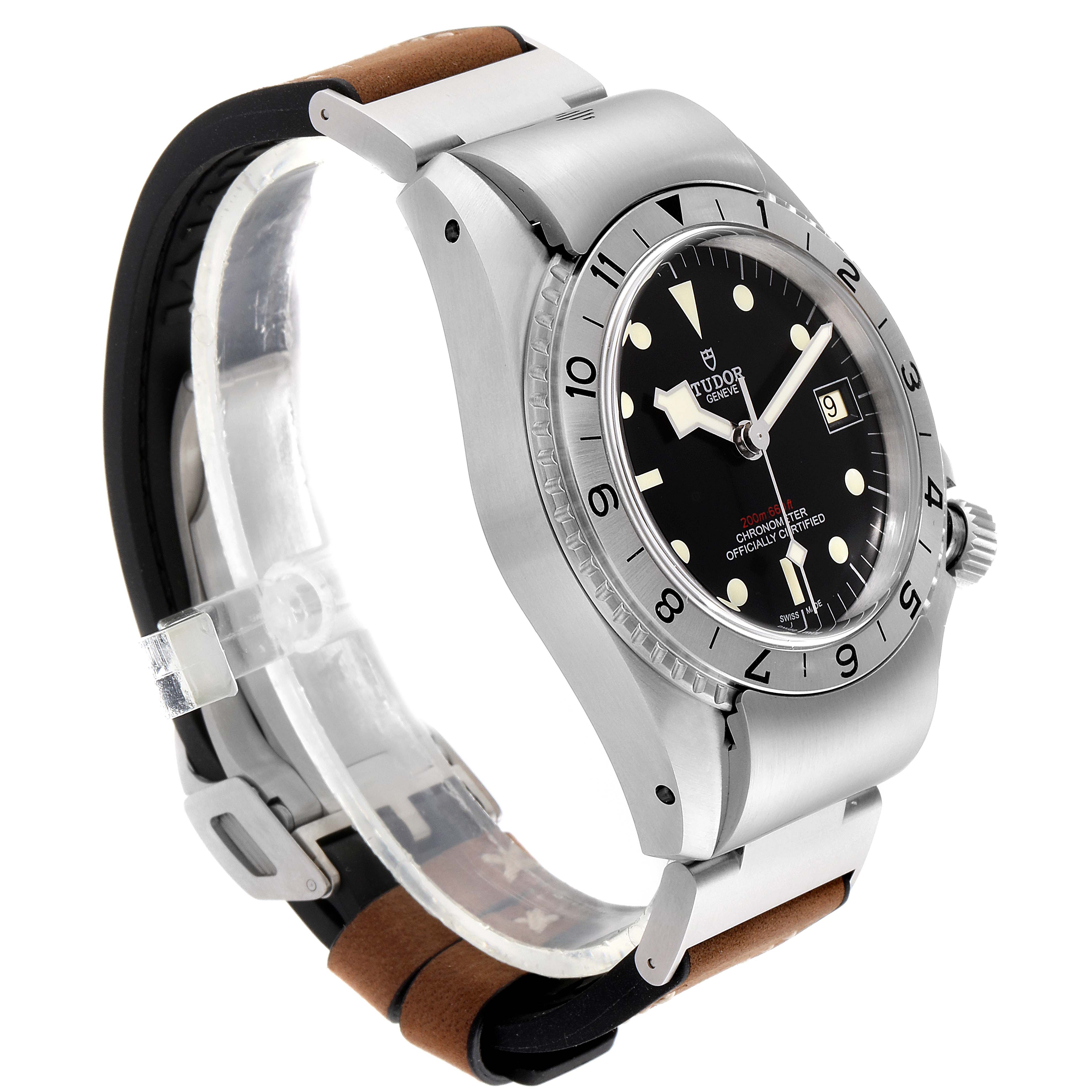 This image shows a side angle of the Tudor Heritage Black Bay M70150-0001 Men
s Stainless Steel Black Dial M70150-0001 Men
s Stainless Steel Black Dial watch, featuring its black dial, bezel, and leather strap.