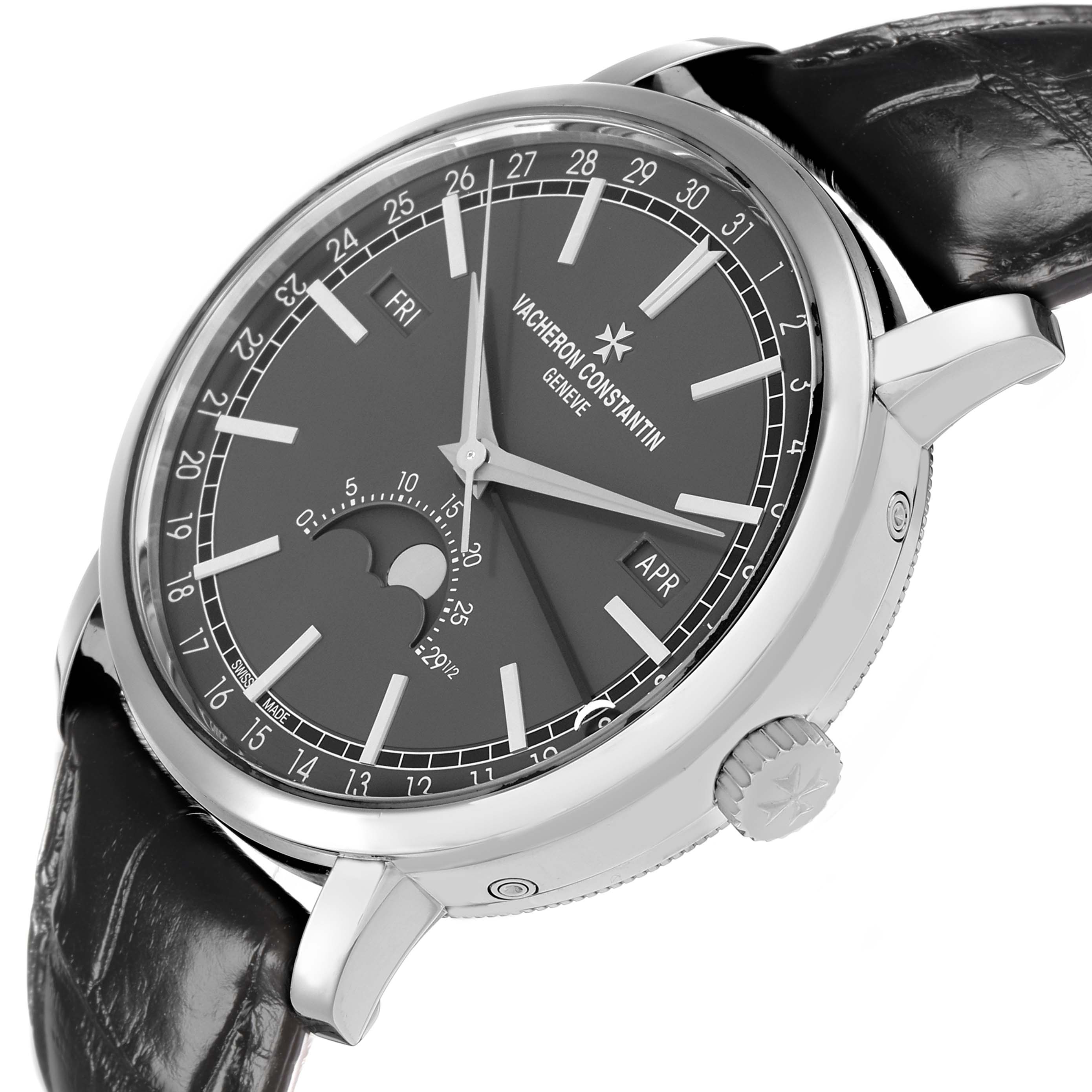 The Vacheron Constantin Traditionnelle 4010T/000G Men
s White Gold Grey Dial watch is shown at an angled side view, highlighting the face, bezel, crown, and strap.