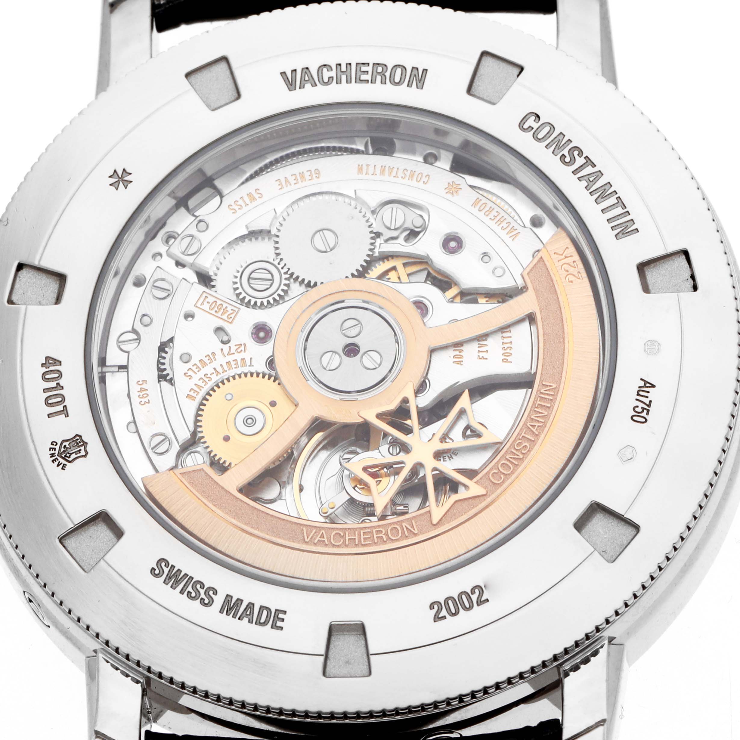 The image shows the back view of the Vacheron Constantin Traditionnelle 4010T/000G Men
s White Gold Grey Dial model, revealing its intricate mechanical movement.