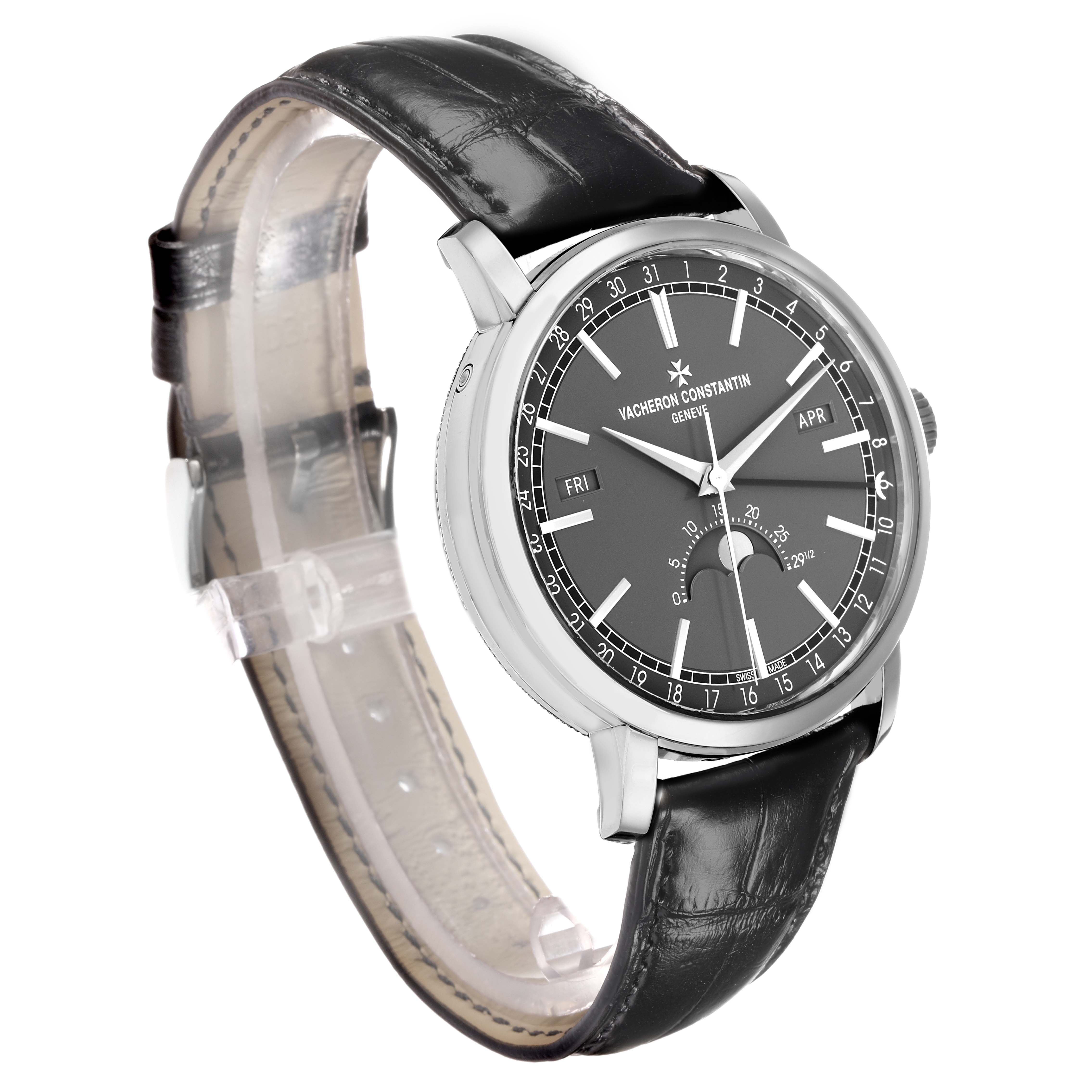 The Vacheron Constantin Traditionnelle 4010T/000G Men
s White Gold Grey Dial watch is shown at an angle displaying the dial, leather strap, and side profile of the case.