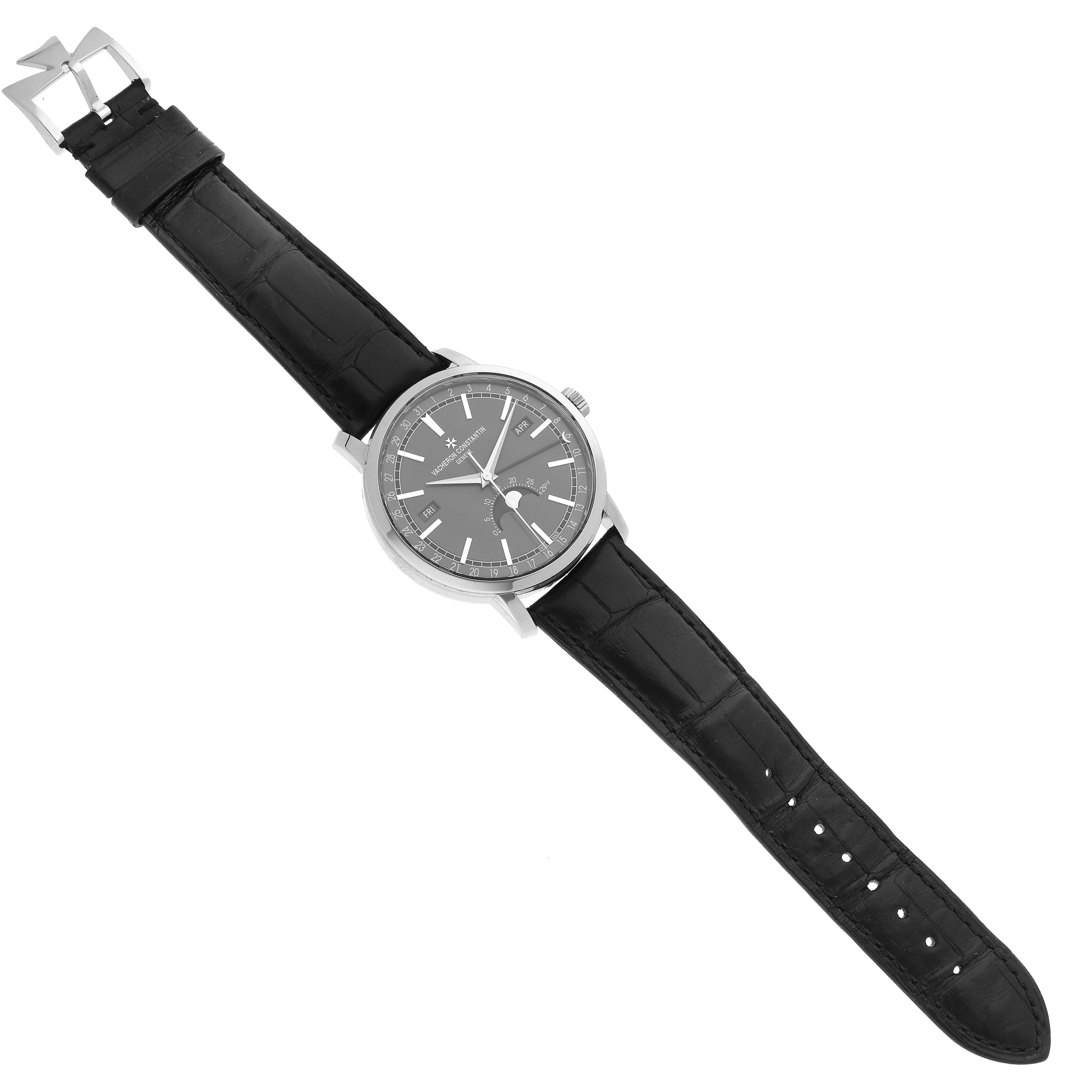 The Vacheron Constantin Traditionnelle 4010T/000G Men
s White Gold Grey Dial watch is shown from a top-down angle, displaying its face, case, and leather strap.