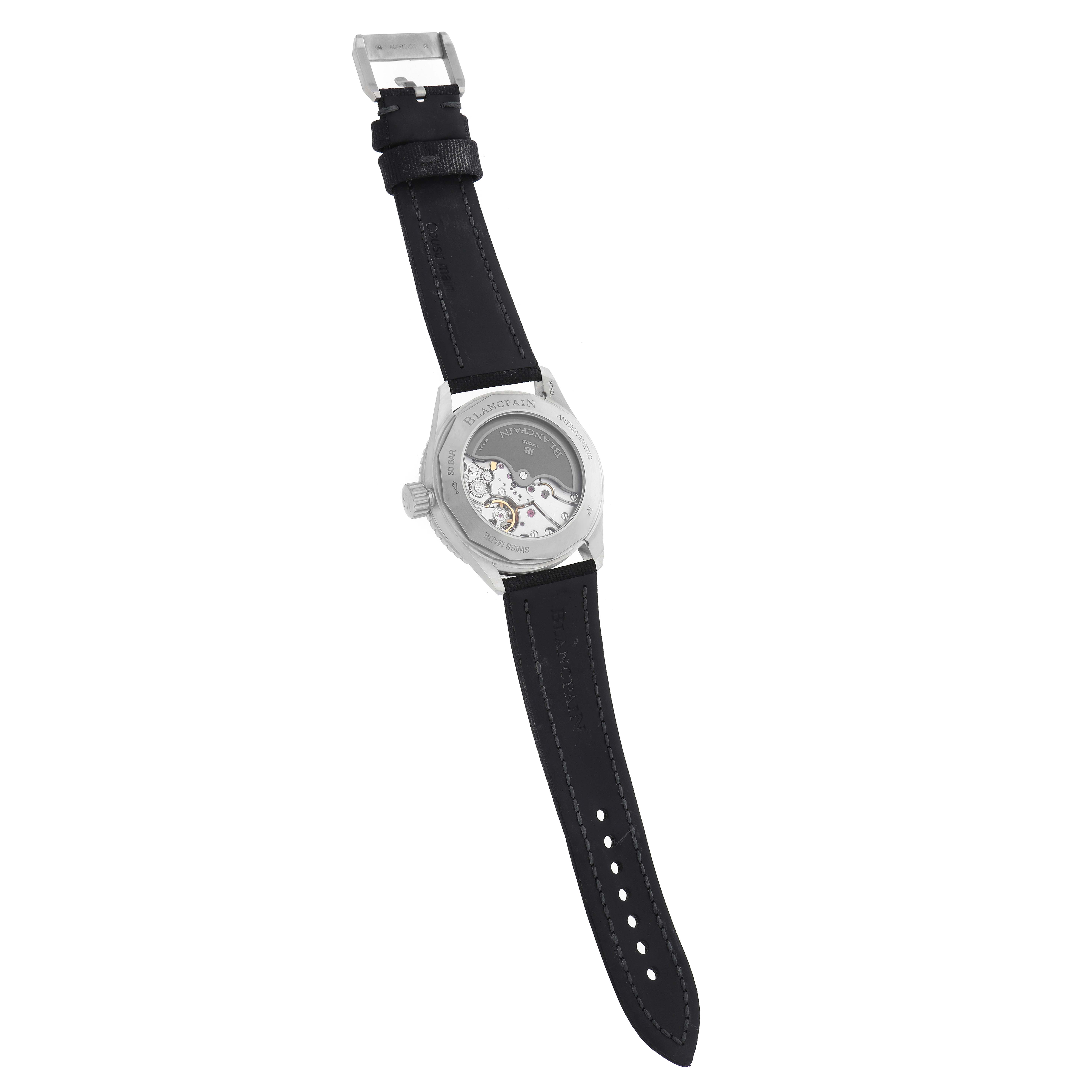 The Blancpain Fifty Fathoms 5100B-1110-B52A Men
s Stainless Steel Grey Dial watch is shown from the back, highlighting the transparent case back and movement details.