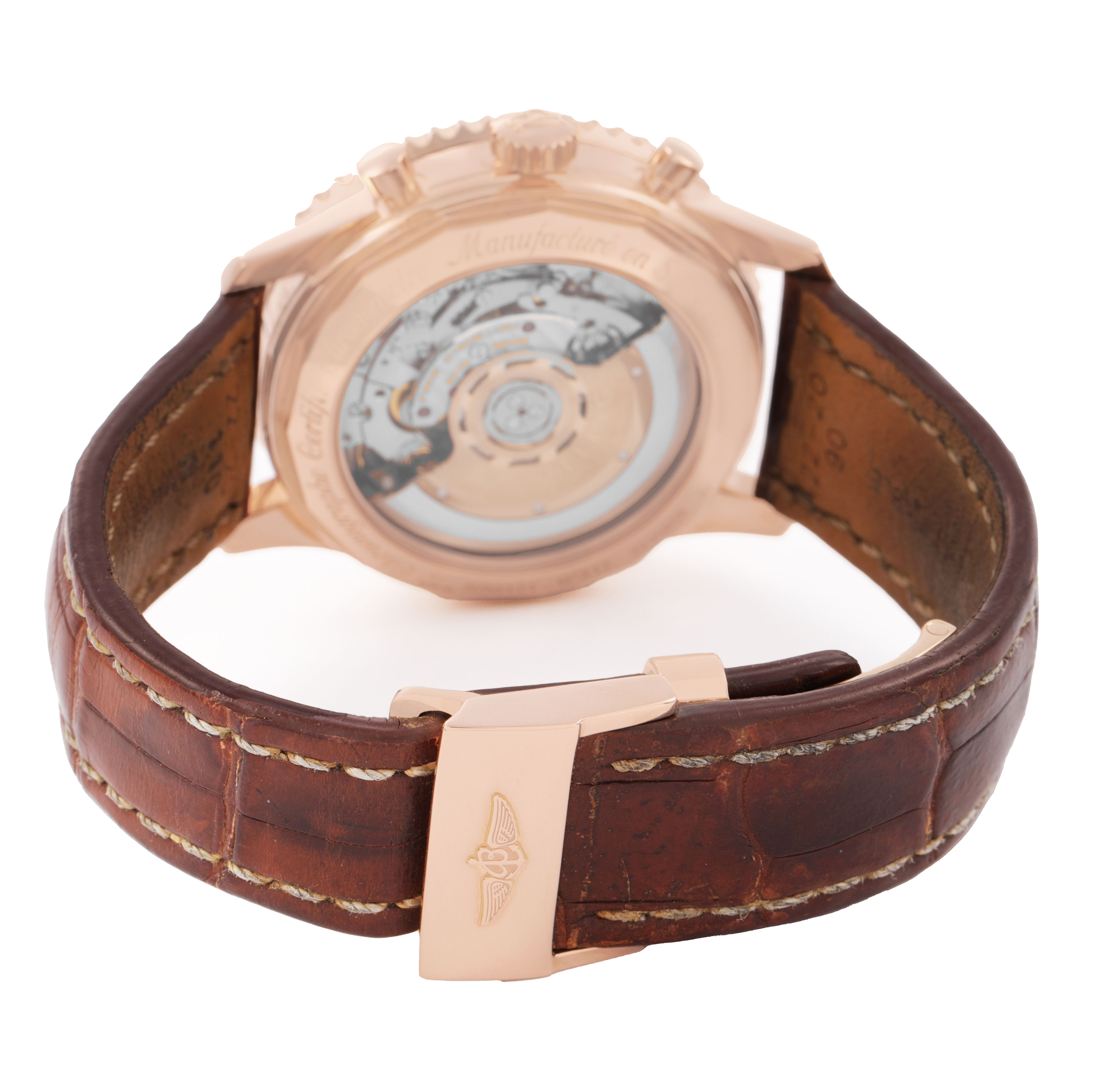 The image shows the back view of the Breitling Navitimer RB0121211C1P4 Men's Rose Gold Blue Dial, highlighting its transparent case back and leather strap.