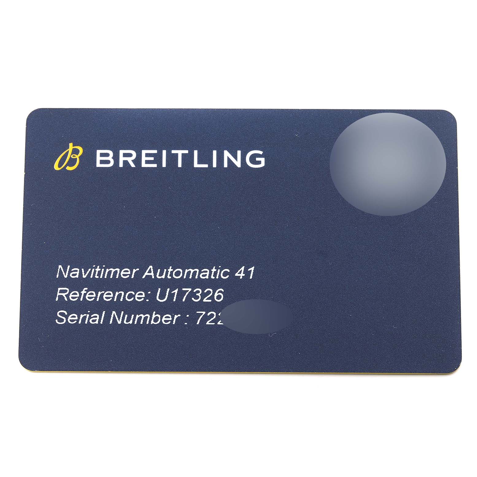 This is a close-up of a warranty card for a Breitling Navitimer U17326211M1P1 Men
s Stainless Steel Grey Dial U17326211M1P1 Men
s Stainless Steel Grey Dial Automatic 41 watch, showing the reference and serial numbers.
