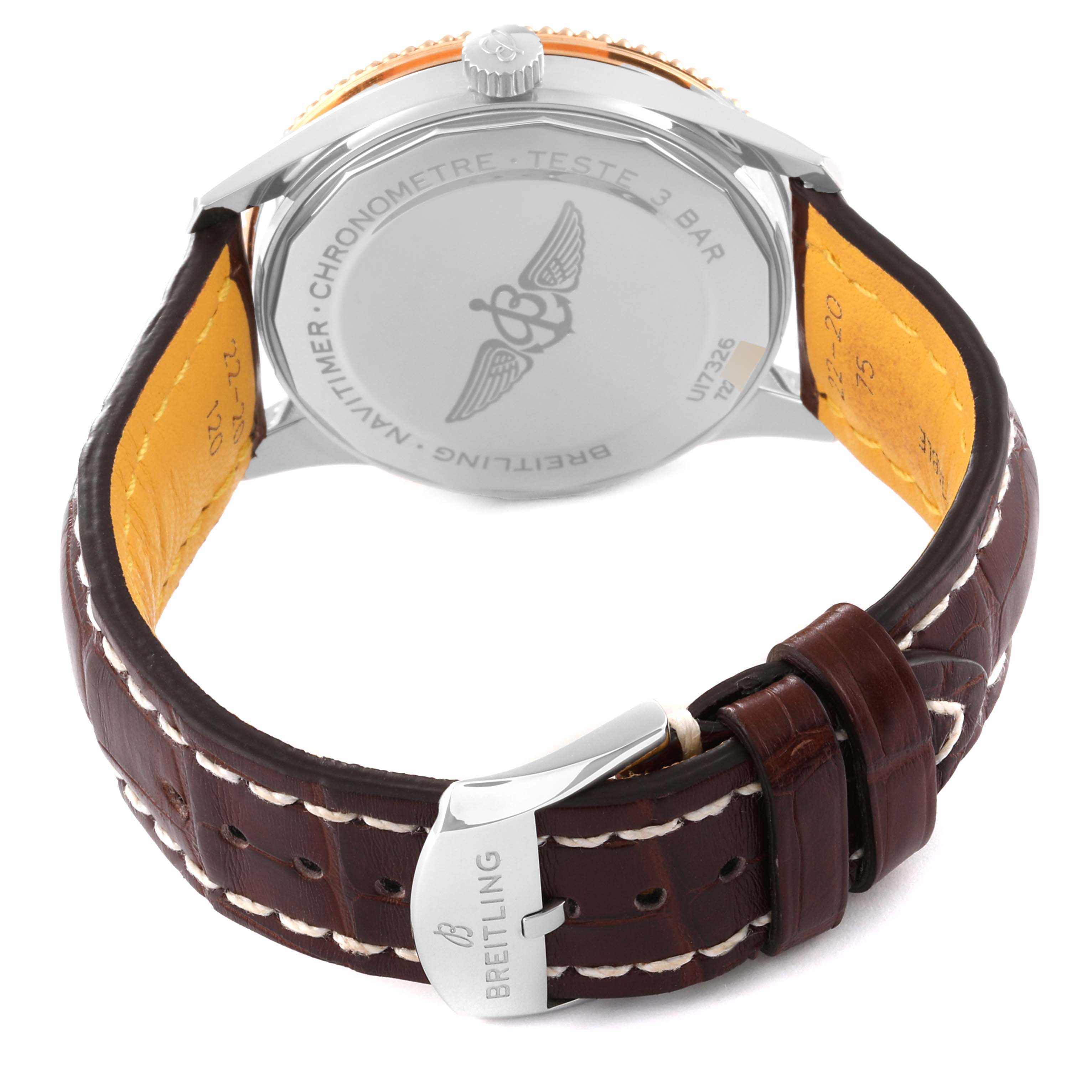 The image shows the back view of a Breitling Navitimer U17326211M1P1 Men
s Stainless Steel Grey Dial U17326211M1P1 Men
s Stainless Steel Grey Dial watch with a brown leather strap and the clasp visible.